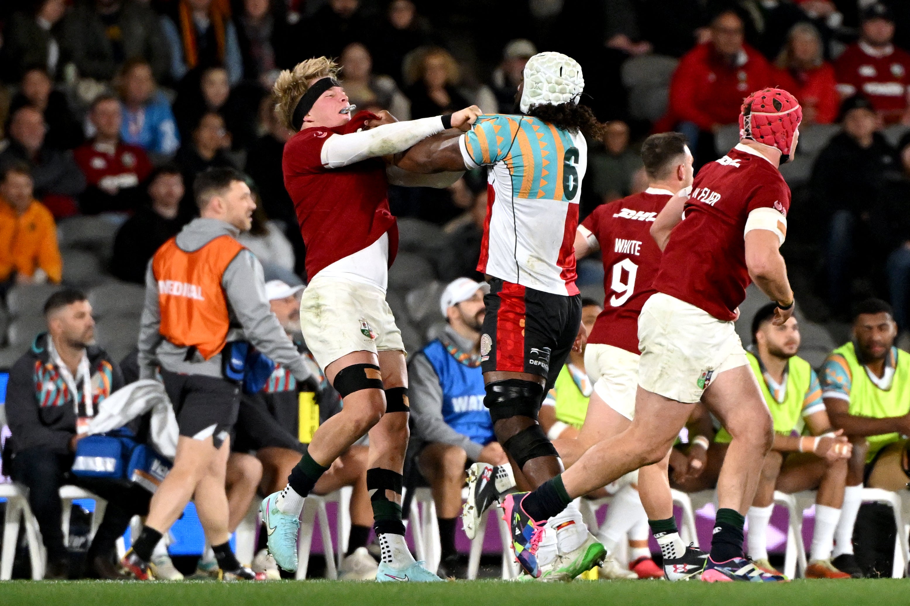 Seru Uru (R) and British and Irish Lions' Henry Pollock scuffle