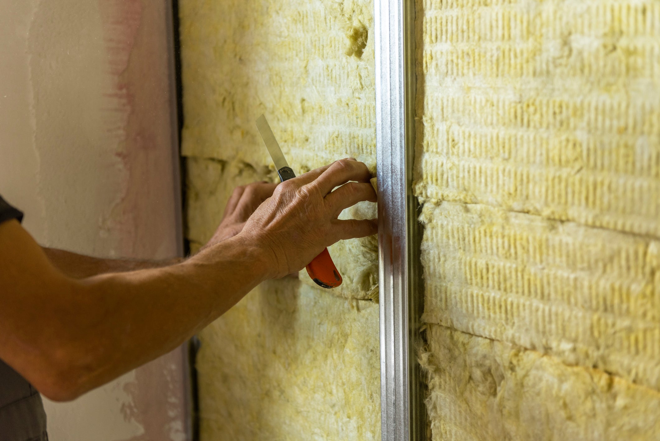 Solid wall insulation made available under two government-backed schemes has shown ‘systemic failure’