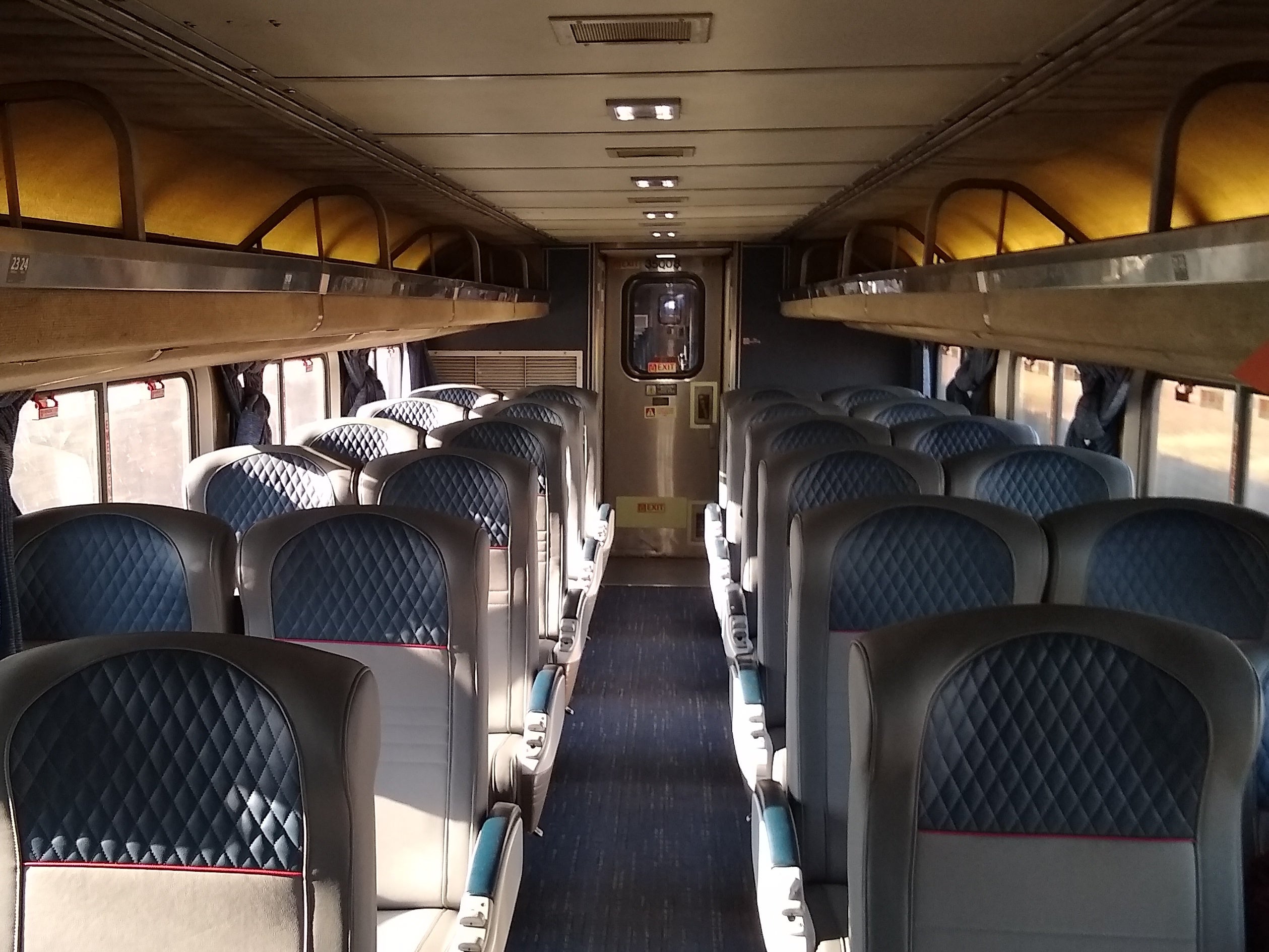 Amtrak coaches, pictured, would form the Transcontinental Chief