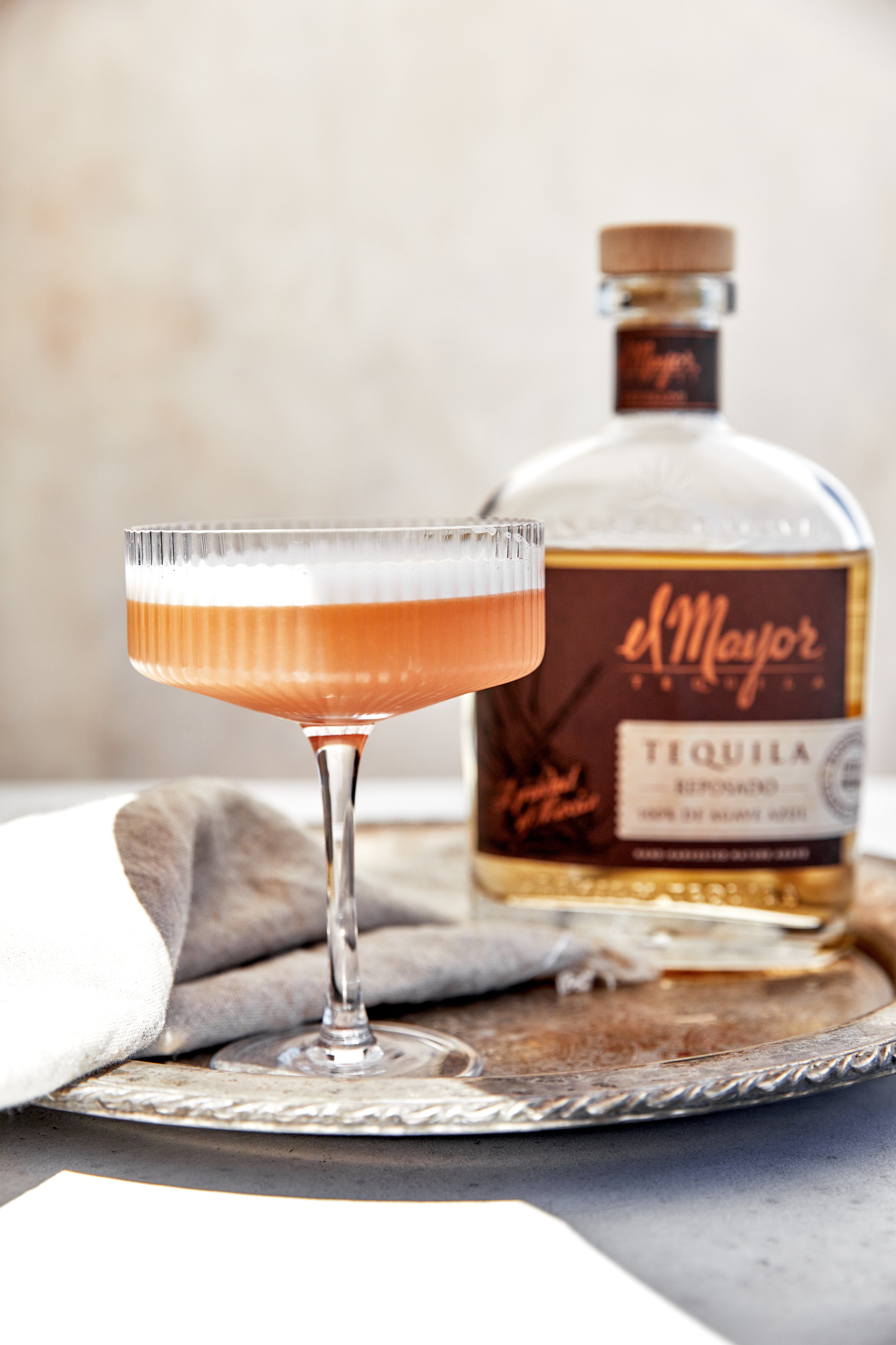 A silky, tart sour with a vibrant colour and a dramatic bitters finish, perfect for after-dark sipping