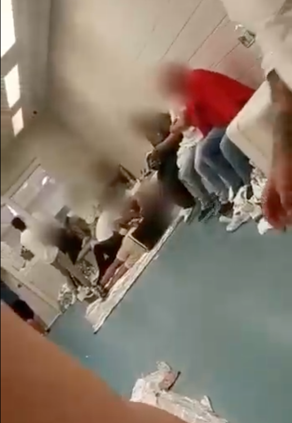 Brutal video reveals makeshift ICE detention facility in Manhattan where immigrants sleep on floors next to toilets