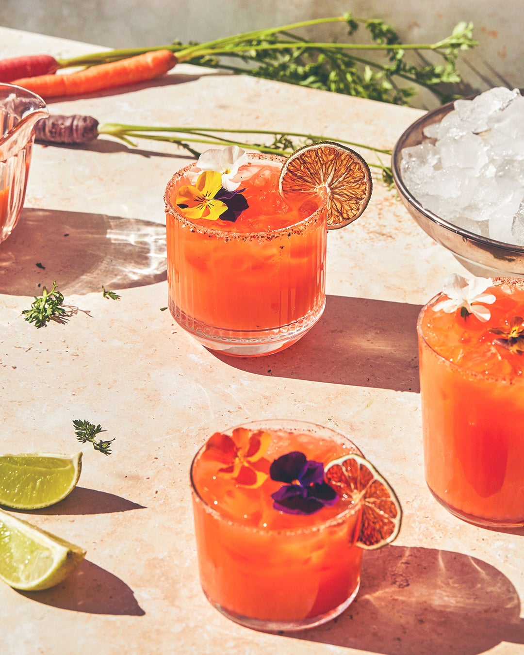 This eye-catching carrot margarita adds a vegetal twist to the classic, balanced with agave and lime