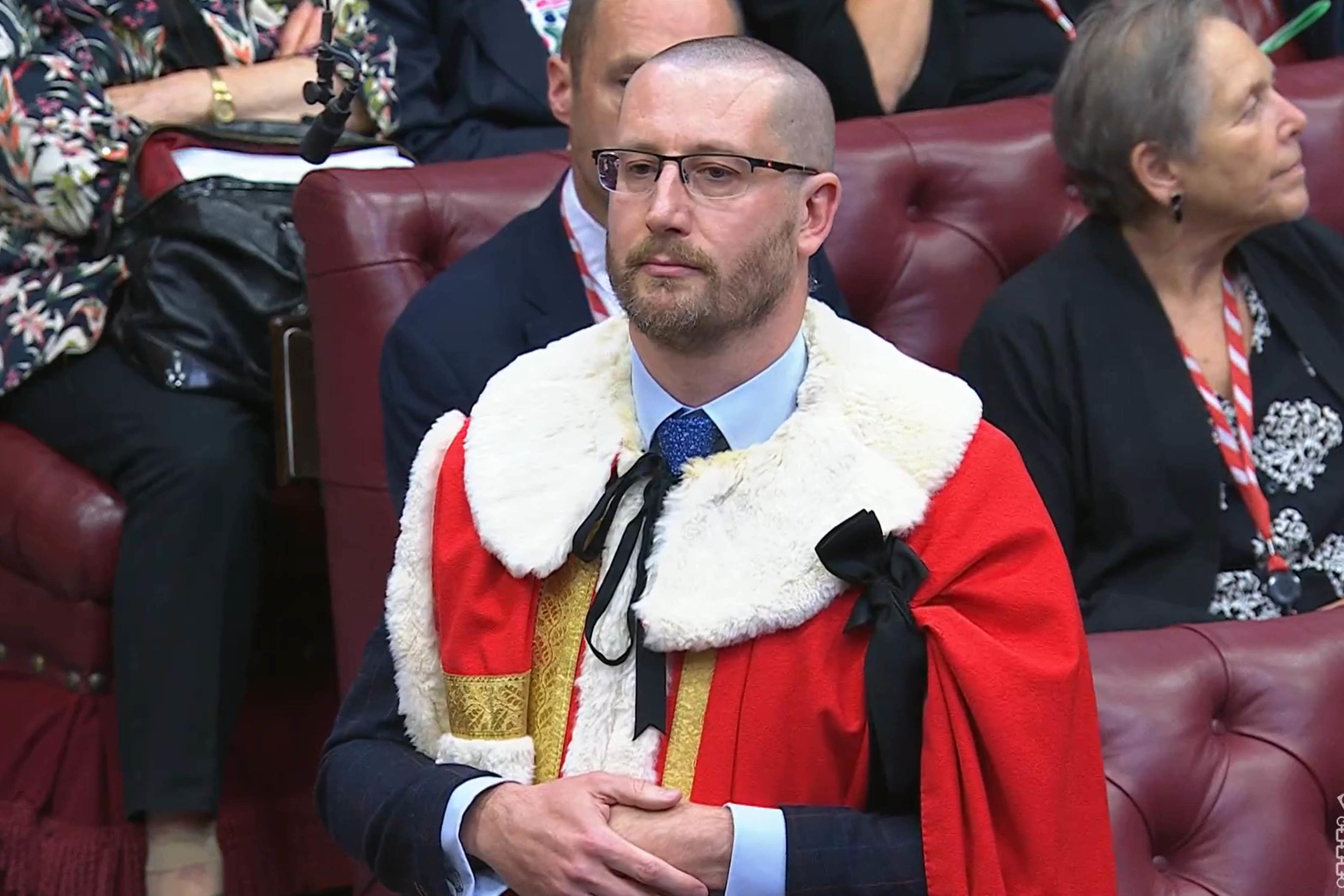 Lord Case wore the traditional scarlet robes for the short introduction ceremony (PA/UK Parliament)