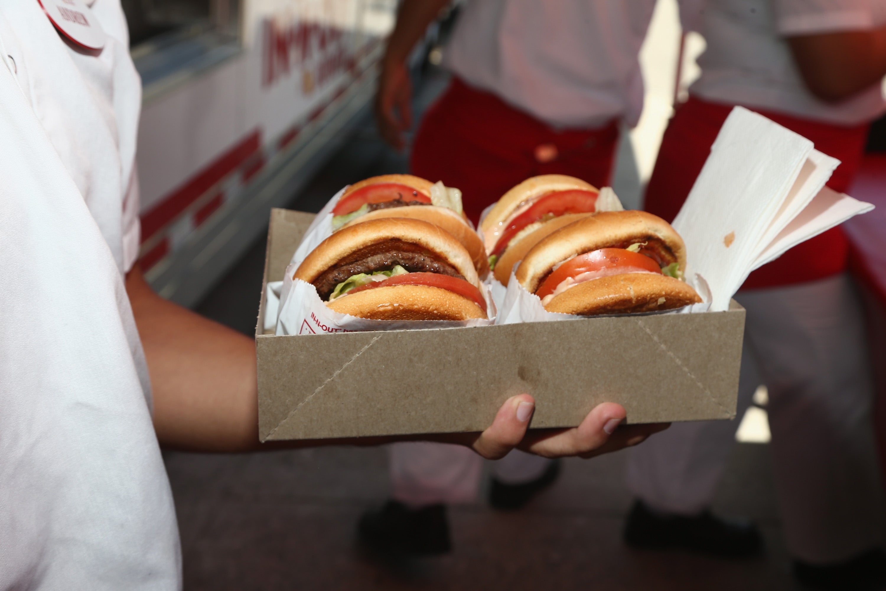 People on social media are calling for a boycott of In-N-Out, inside encouraging customers to try a local restaurant.