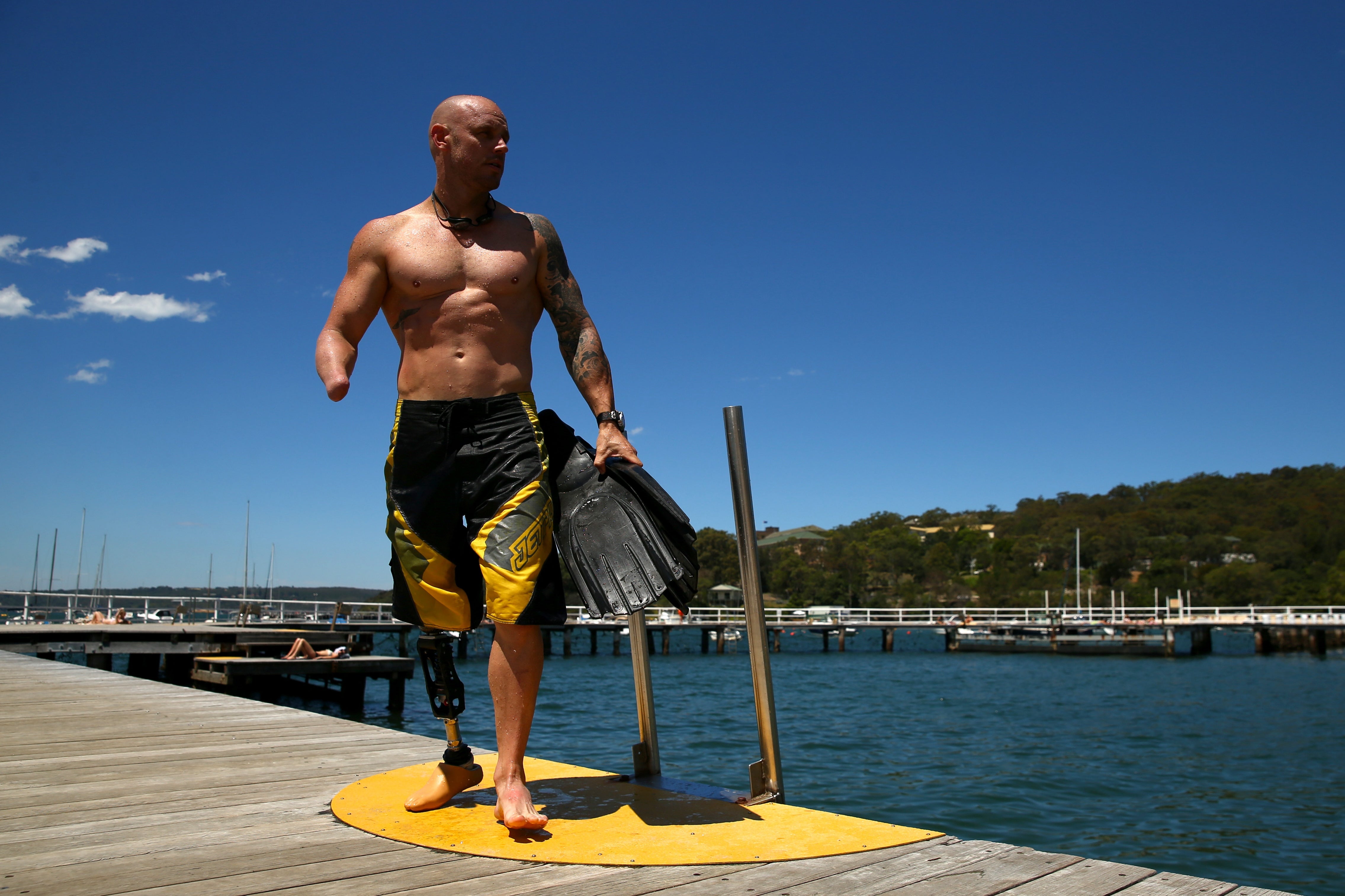 Former Australian Navy diver and shark attack survivor Paul de Gelder, who lost his right hand and leg in a 2009 Sydney Harbor attack, is hoping that his retelling and advice can keep others safe.