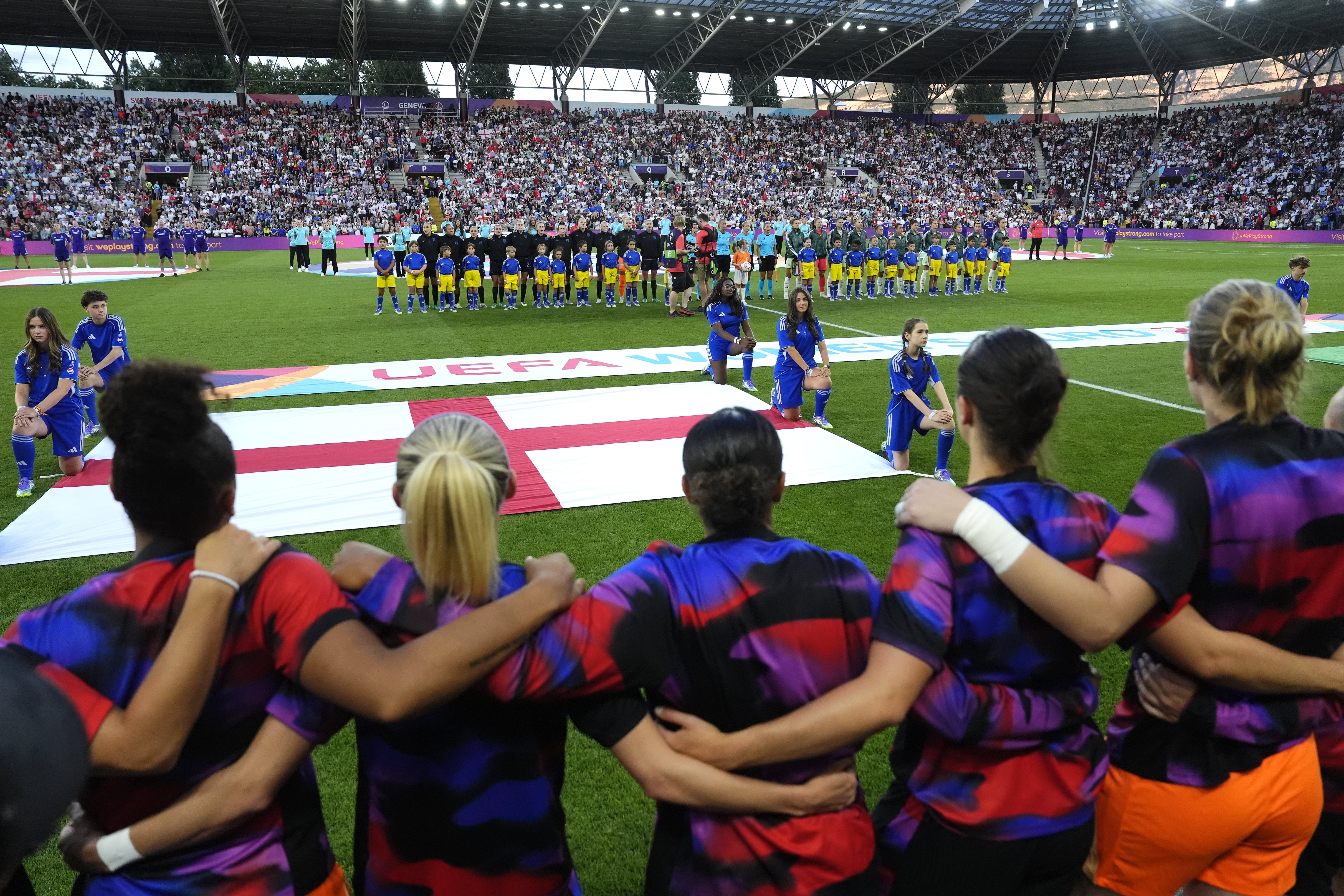 England stand in solidarity Carter (centre) before Tuesday’s Italy game. ‘Jess Carter shouldn’t have to be resilient in the face of racism. She should be protected from it’