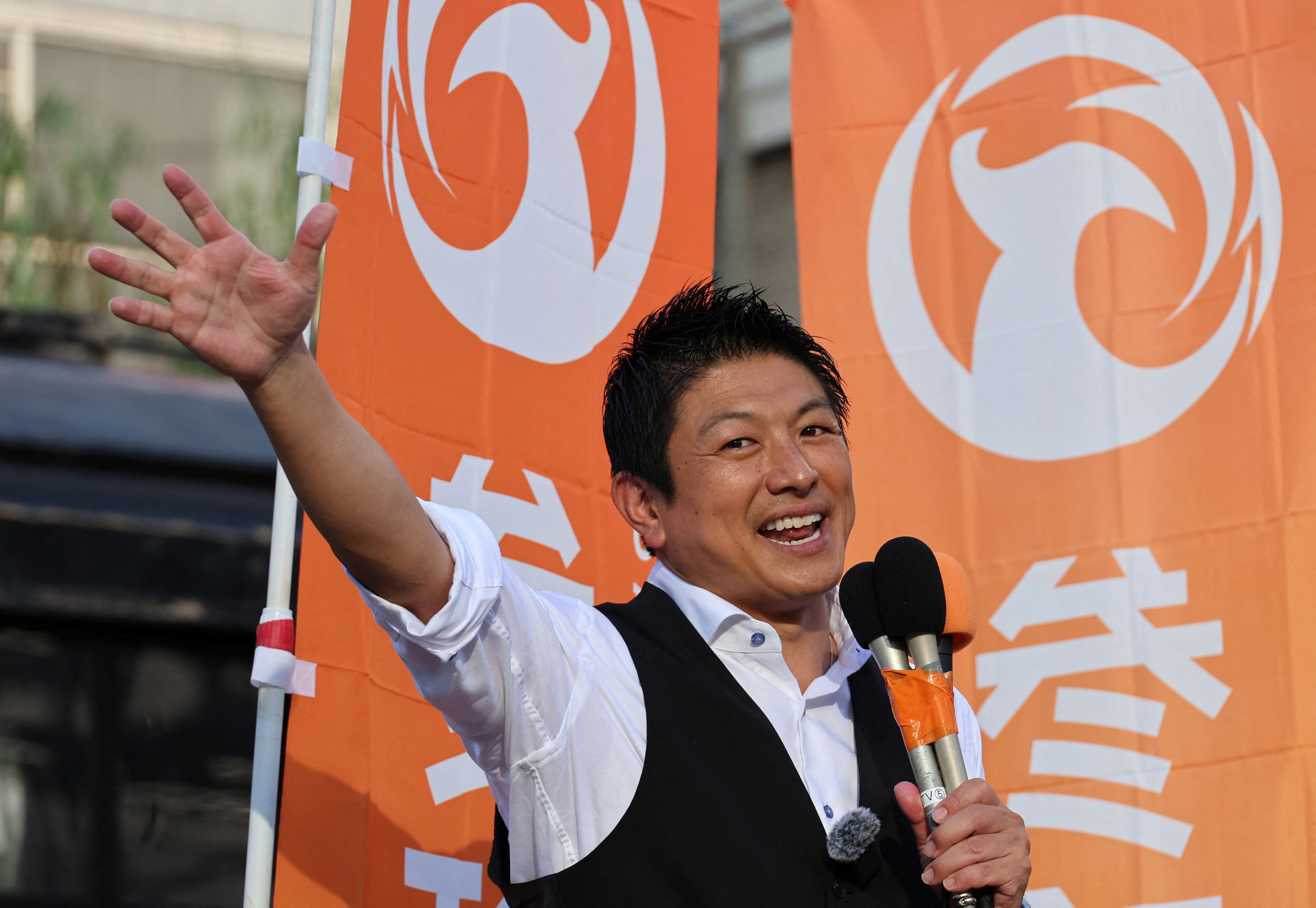 Japan's Sanseito party leader Sohei Kamiya delivers a speech during the party's rally in Tokyo
