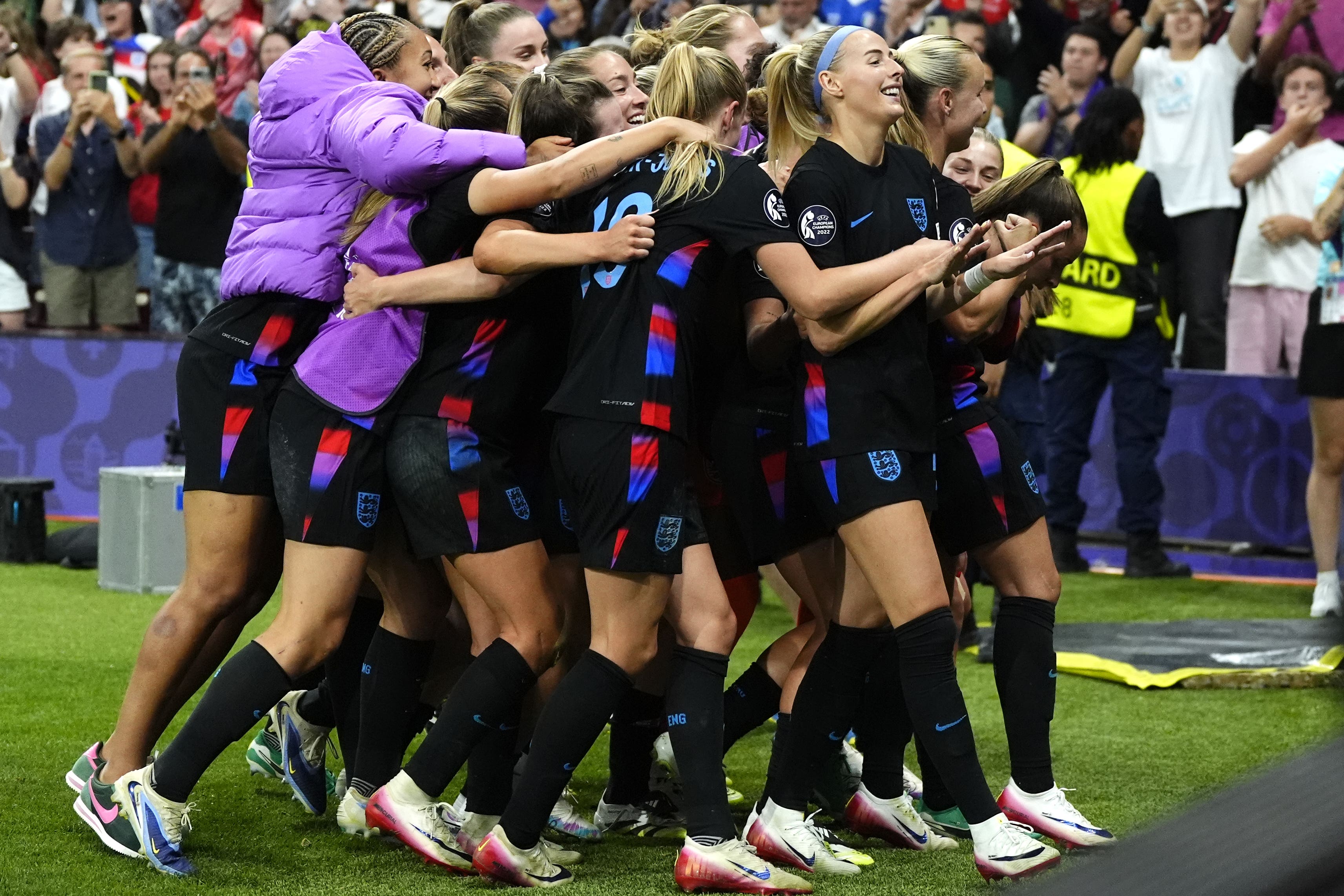 Chloe Kelly, right, celebrates scoring England’s winning goal against Italy (Nick Potts/PA)