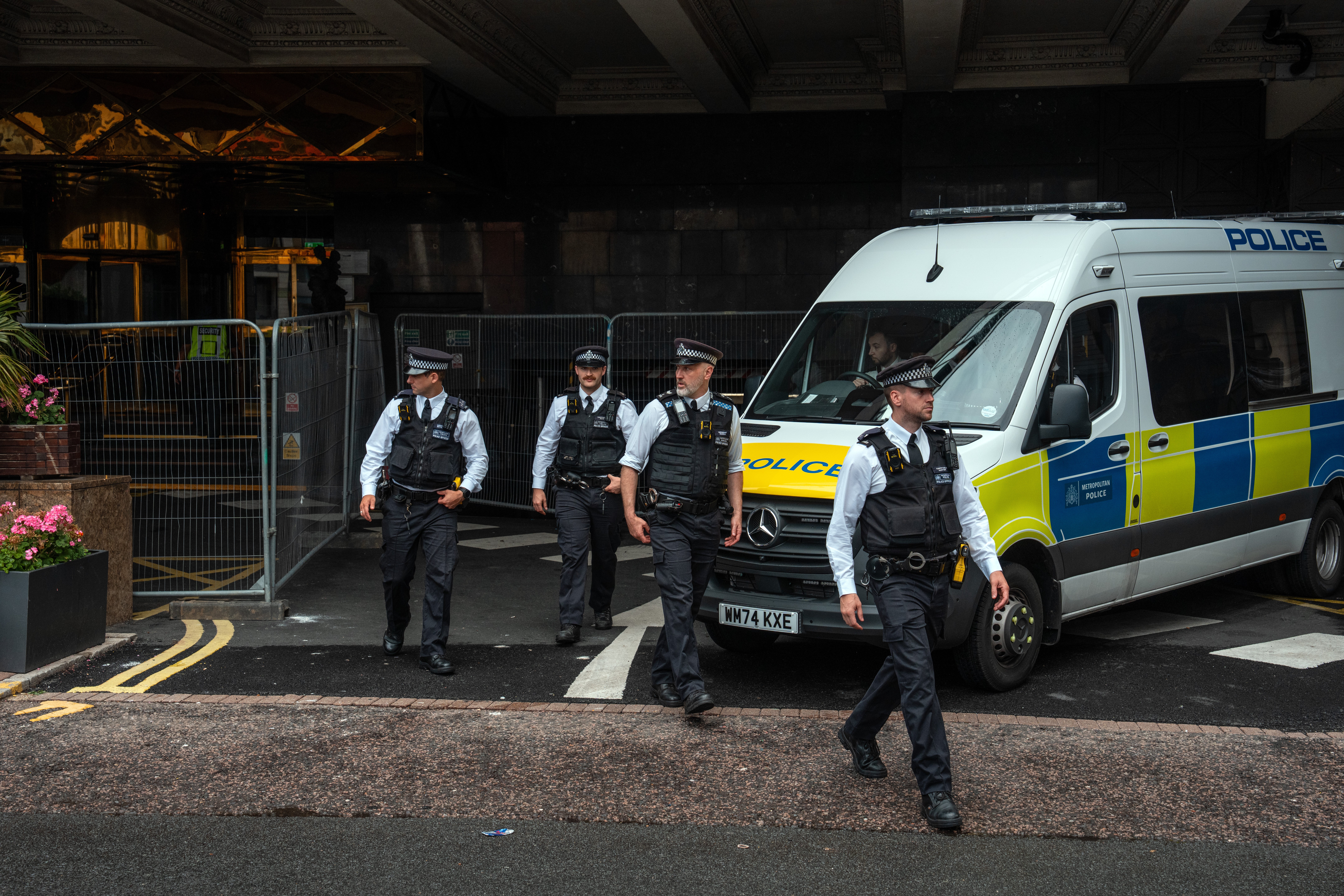 Police attended as demonstrators gathered outside the hotel