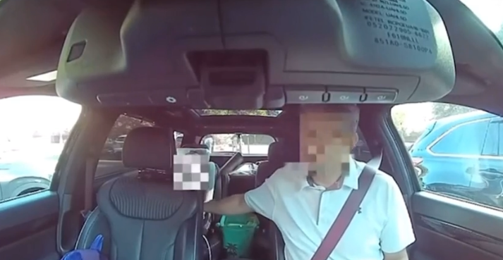 Khanbabazadeh can be seen in the footage talking with his child about the police officers mere minutes before he was arrested.