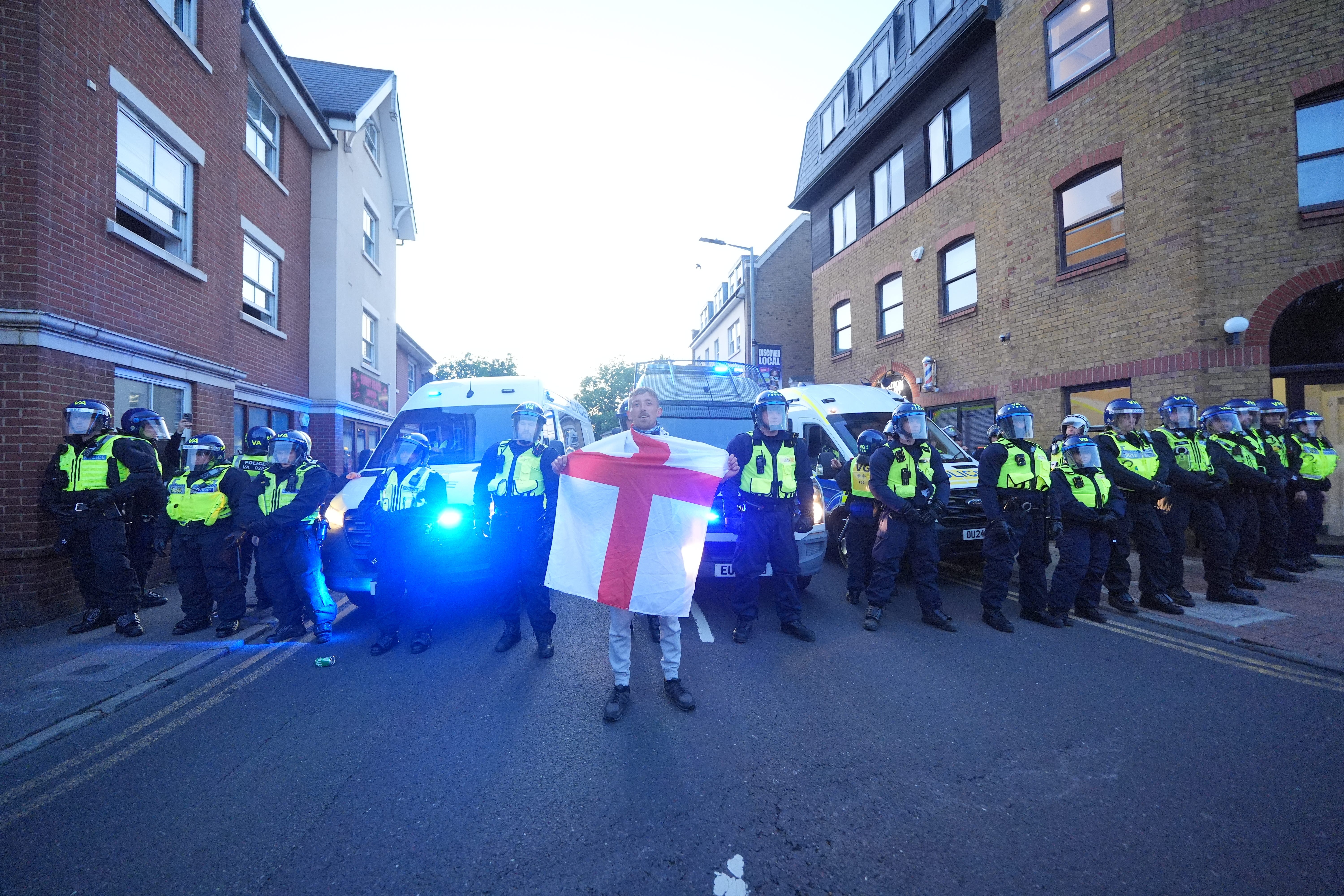 A protester outside the Bell Hotel in Epping last month