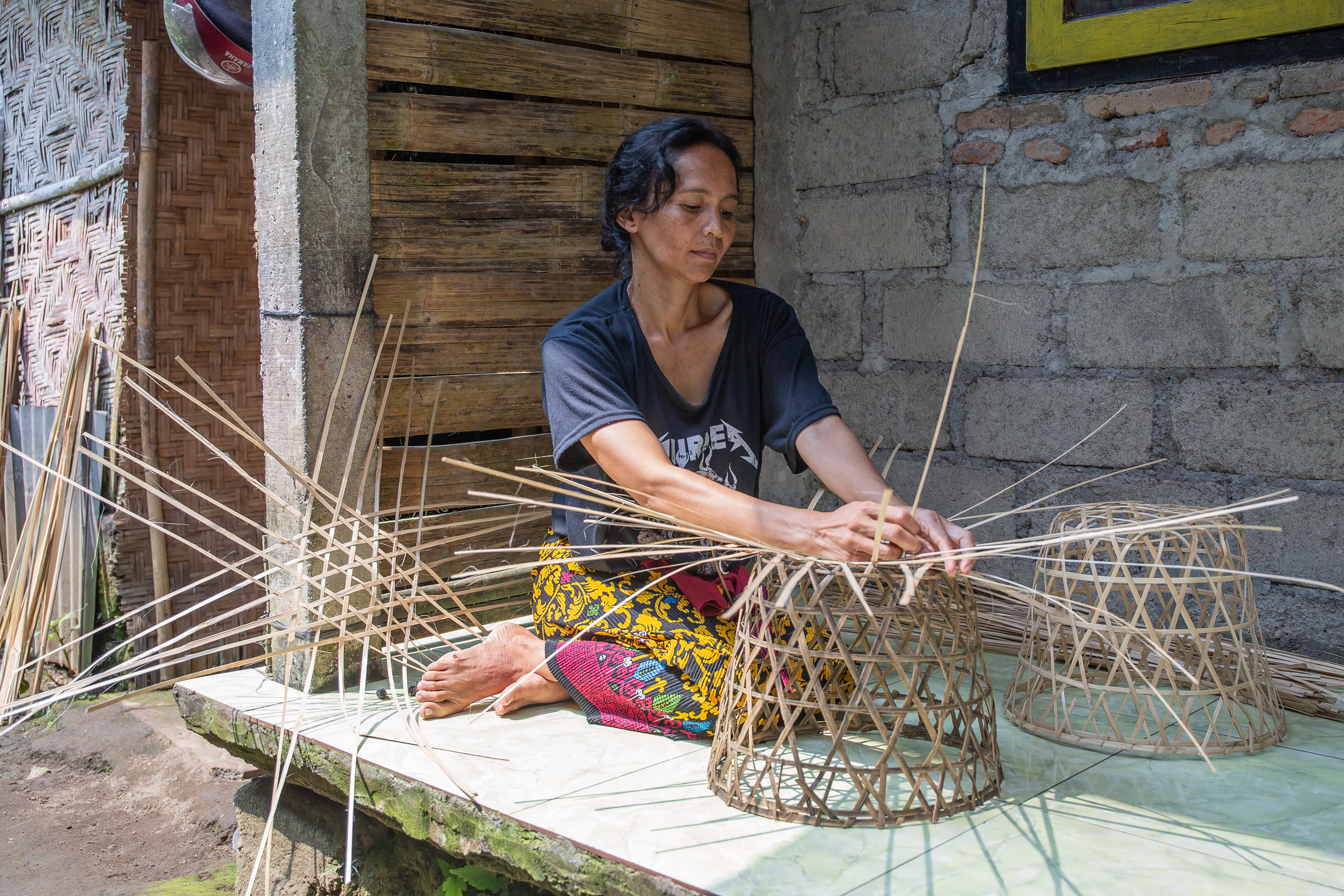 Guests to the village can try their hand at basket weaving with local people