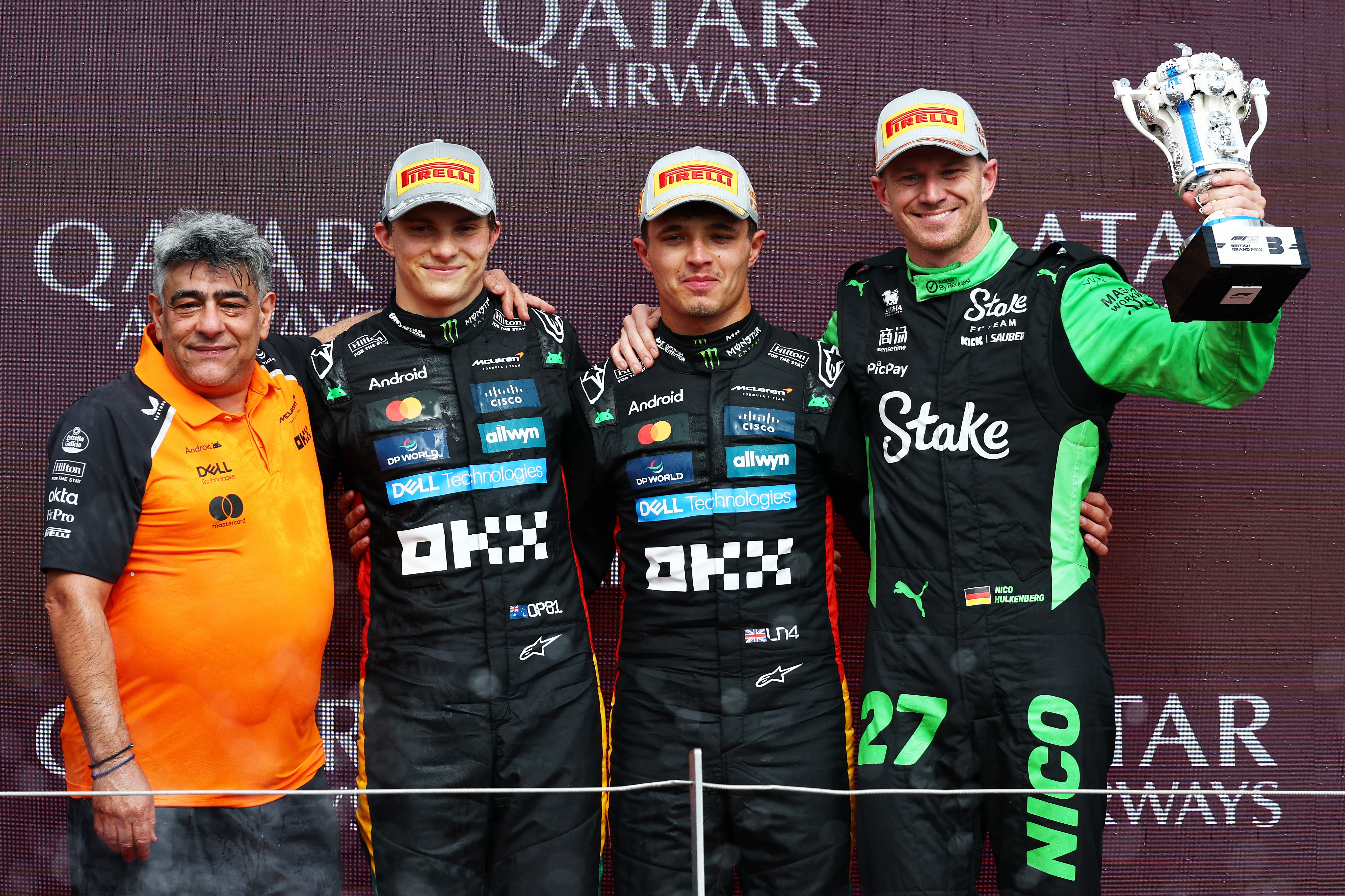 Hulkenberg (far-right) finished on the podium at the British Grand Prix