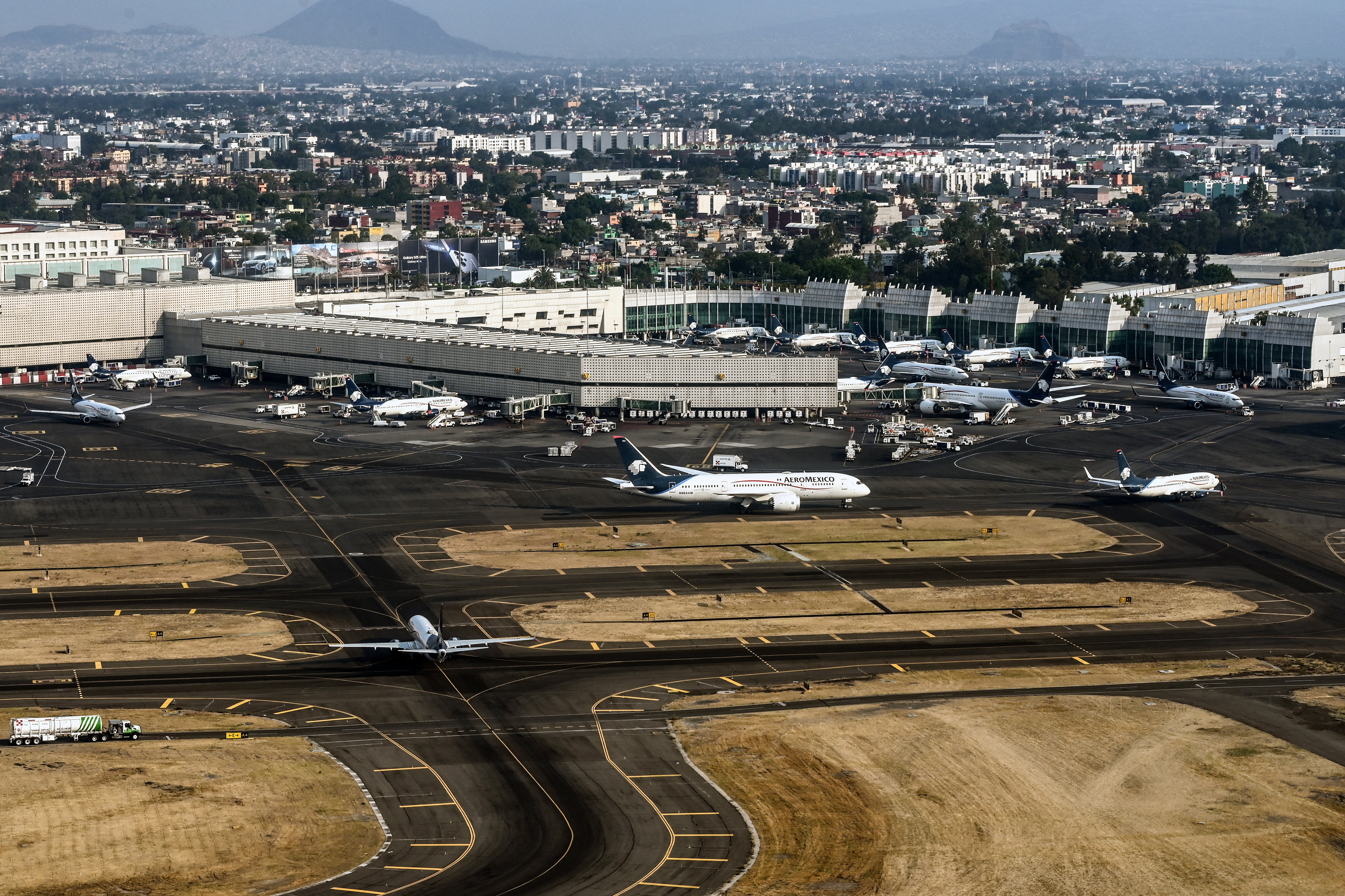 The Delta flight bound for Atlanta had to stop takeoff and return to its terminal at Benito Juarez International Airport after an AeroMéxico jet flew over the plane and landed in front of it, according to reports