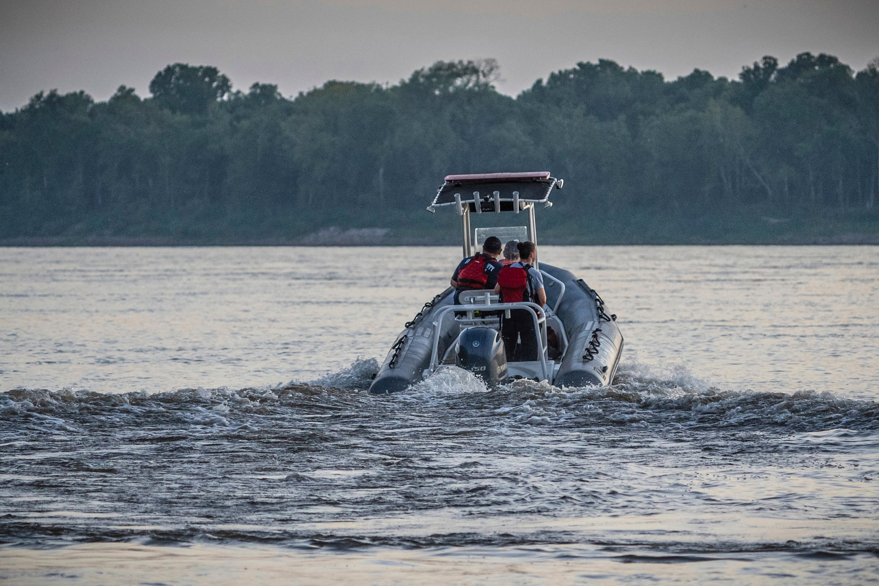 Search and rescue teams look for three men who were reported missing while swimming and fishing on a sandbar in the Mississippi River on Tuesday, July 22, 2025 near Memphis. (Kenneth Hiner/Shelby County Sheriff's Office via AP)