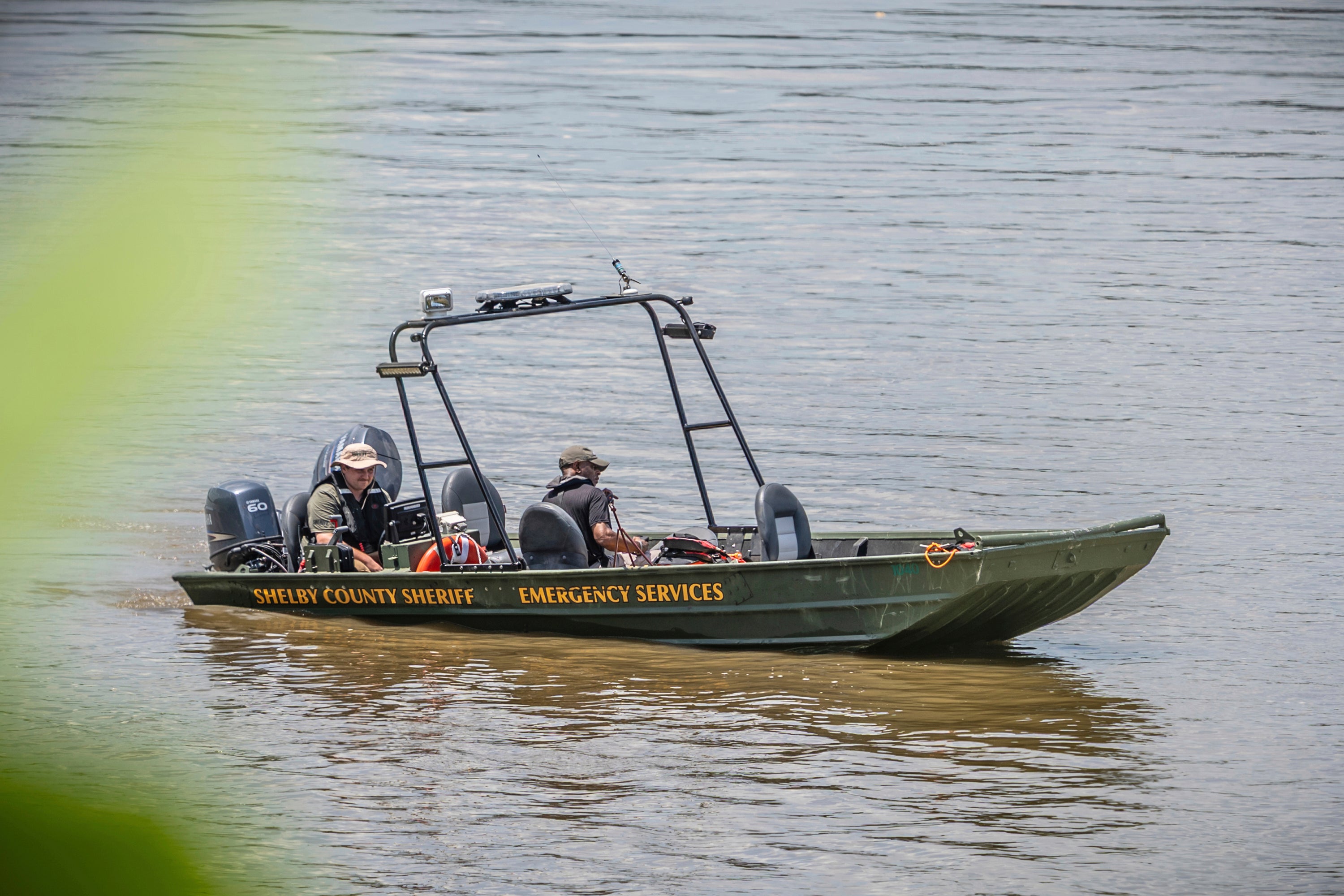 Search and rescue teams look for three men who were reported missing while swimming and fishing on a sandbar in the Mississippi River on Tuesday, July 22, 2025 near Memphis