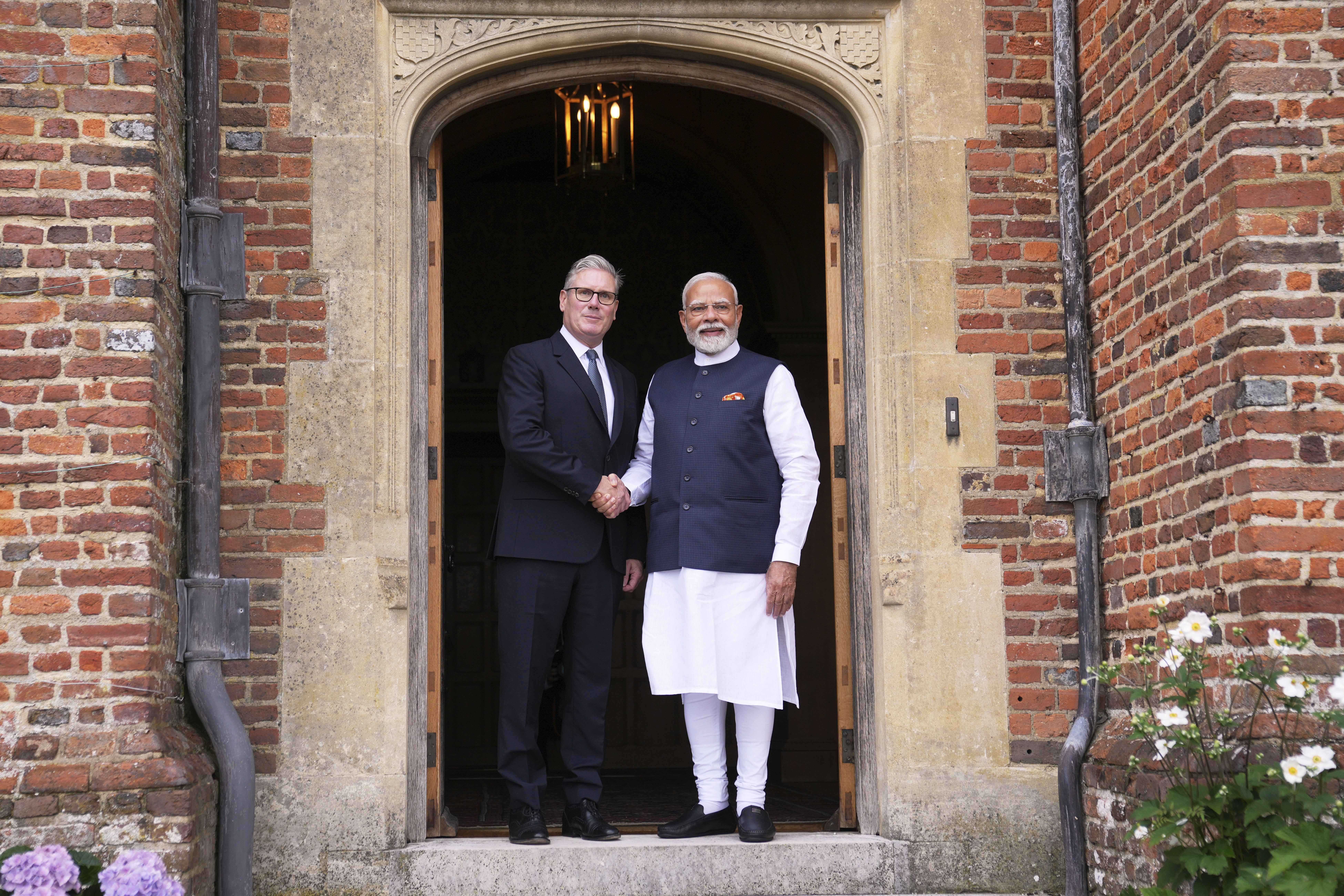 Prime Minister Sir Keir Starmer with India’s Narendra Modi at Chequers (Kin Cheung/PA)