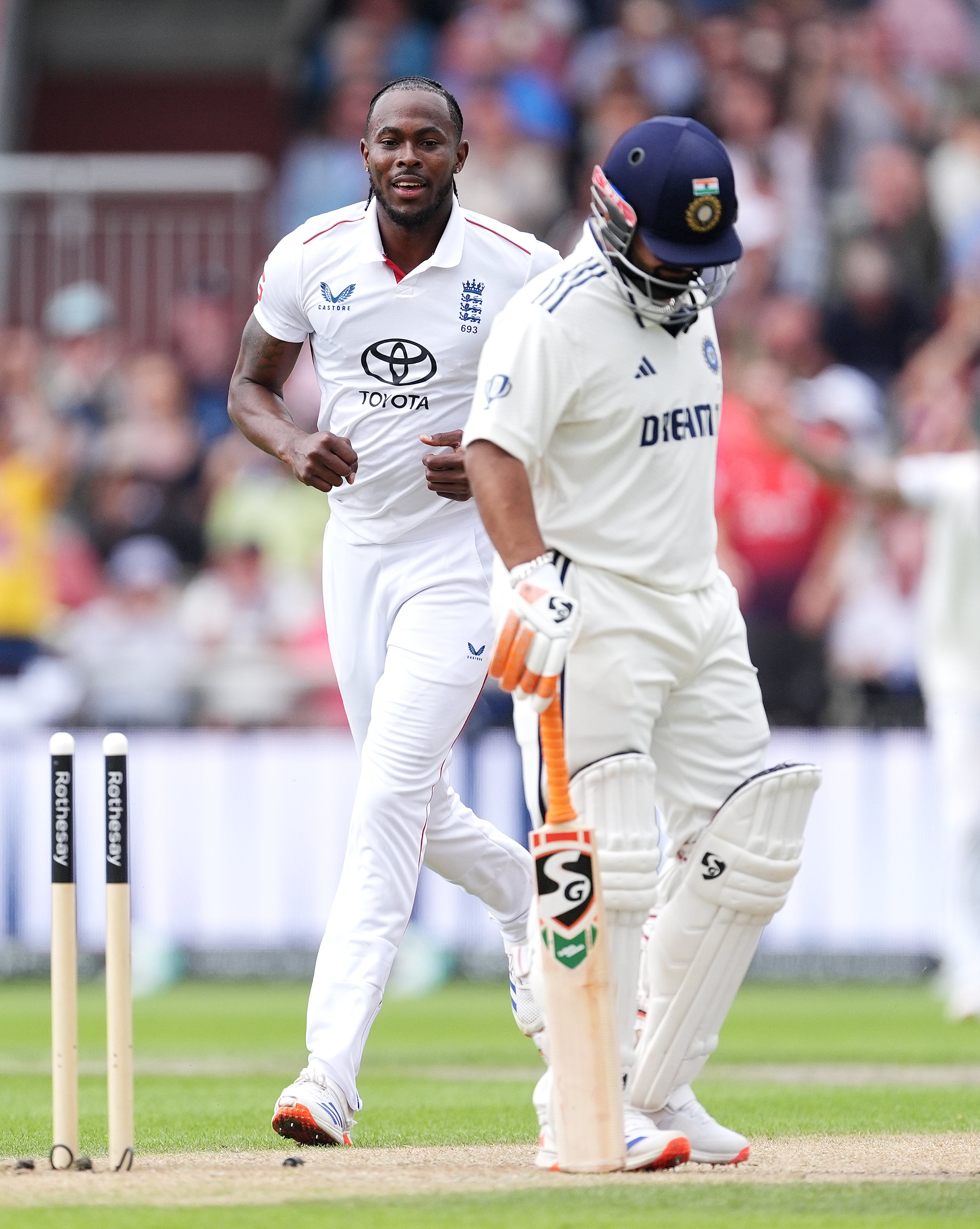 England's Jofra Archer (left) celebrates taking the wicket of India's Rishabh Pant