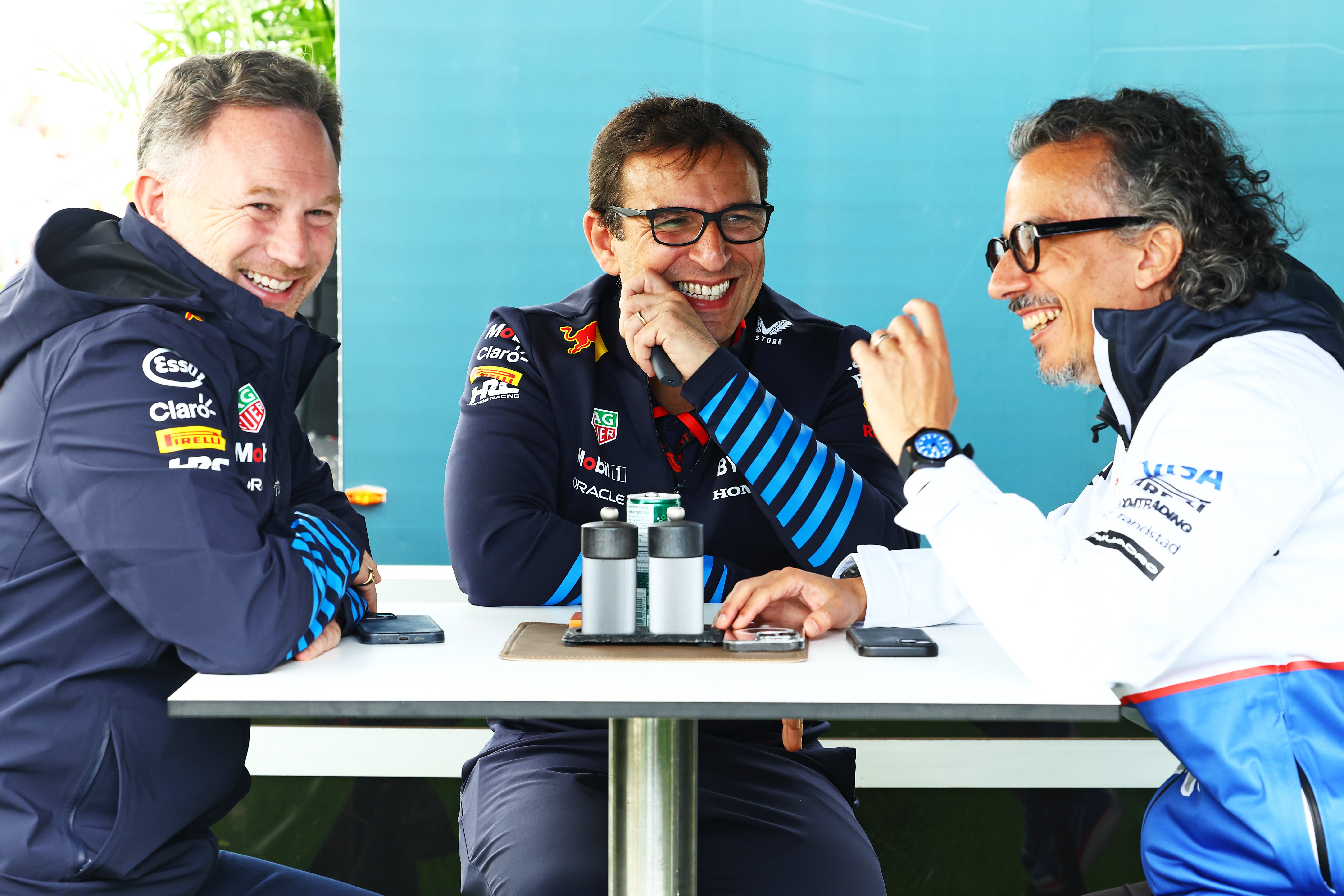 Christian Horner (left) speaks to Laurent Mekies (right) and technical director Pierre Wache (centre) last year