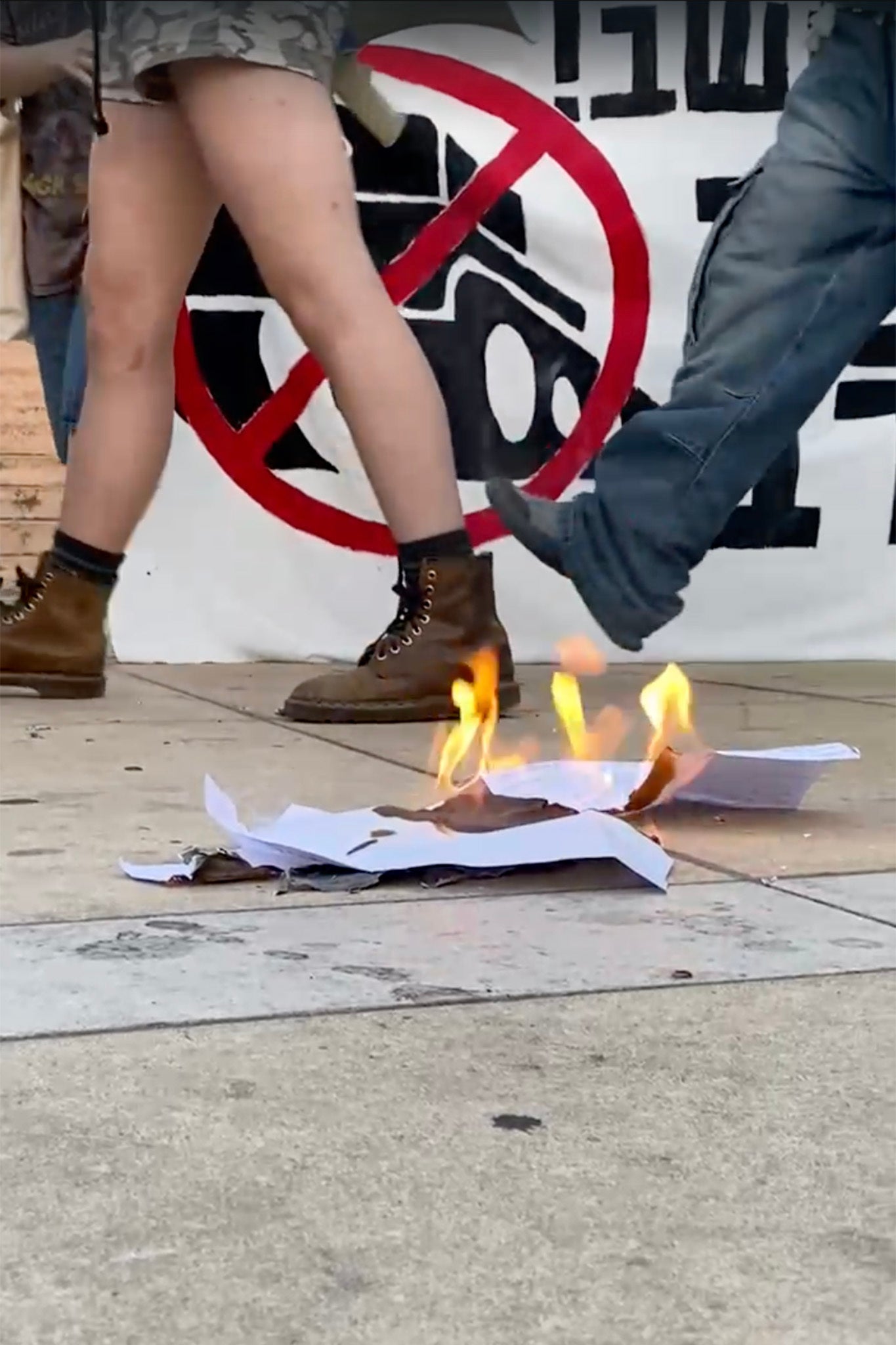 An IDF draft letter burning on the ground