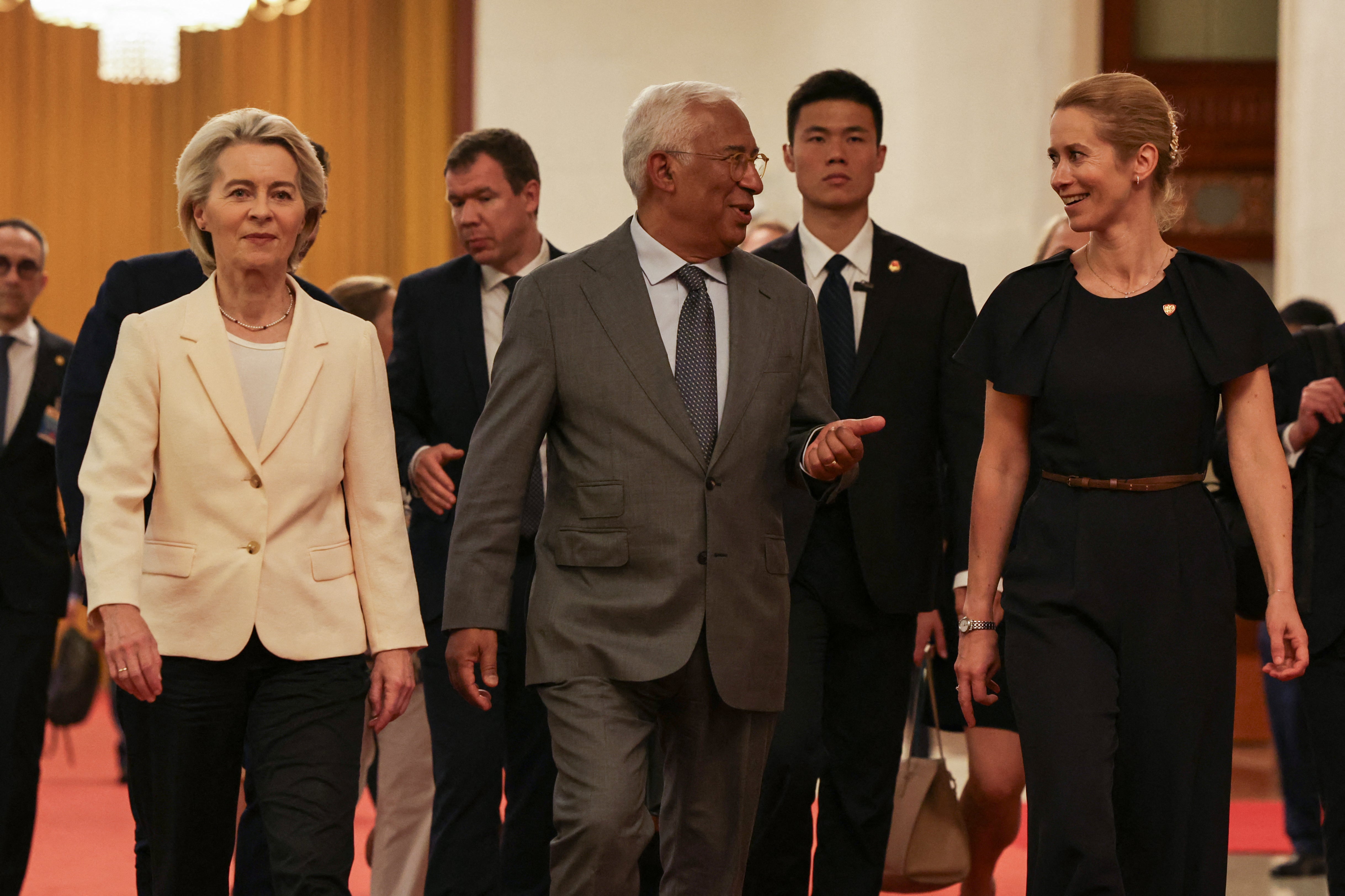 Ursula von der Leyen, Antonio Costa and Kaja Kallas arrive at the Great Hall of the People for the 25th EU-China Summit in Beijing