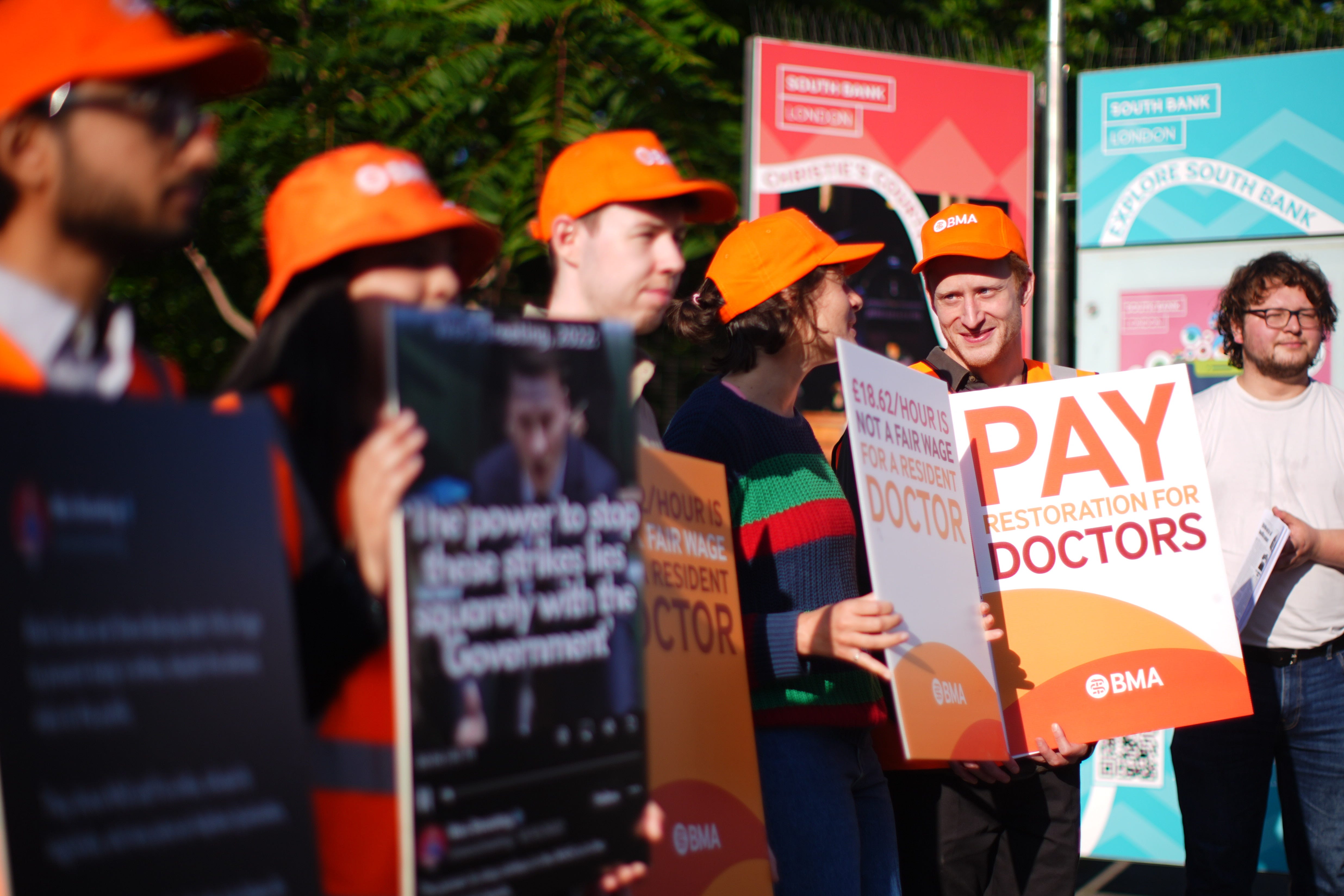 NHS resident doctors outside St Thomas’ Hospital in London as they start a five-day strike (James Manning/PA)
