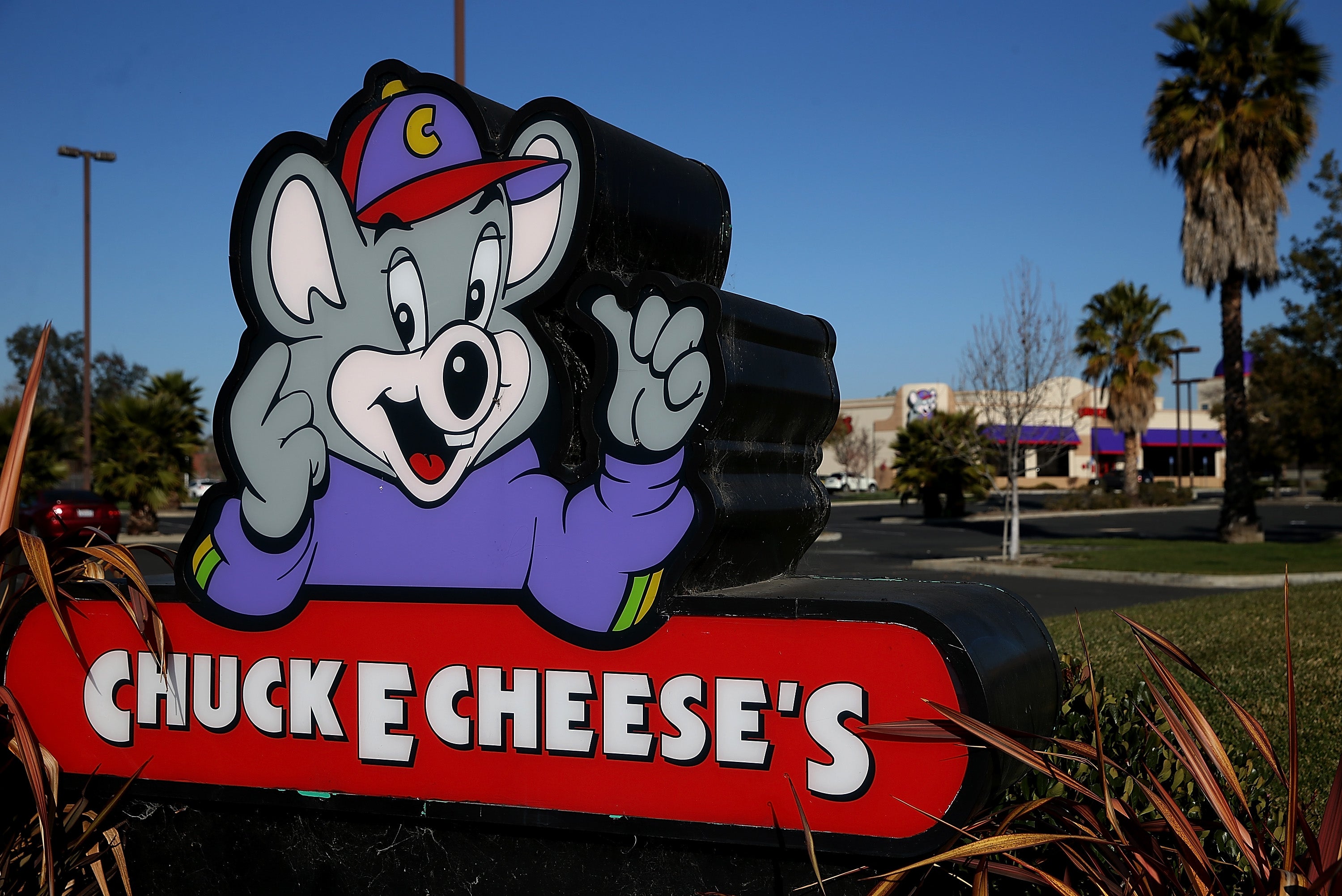 Kids watched a Chuck E. Cheese employee in Florida get arrested on credit card fraud allegations Thursday as he wore the pizza chain’s famous mouse mascot costume.