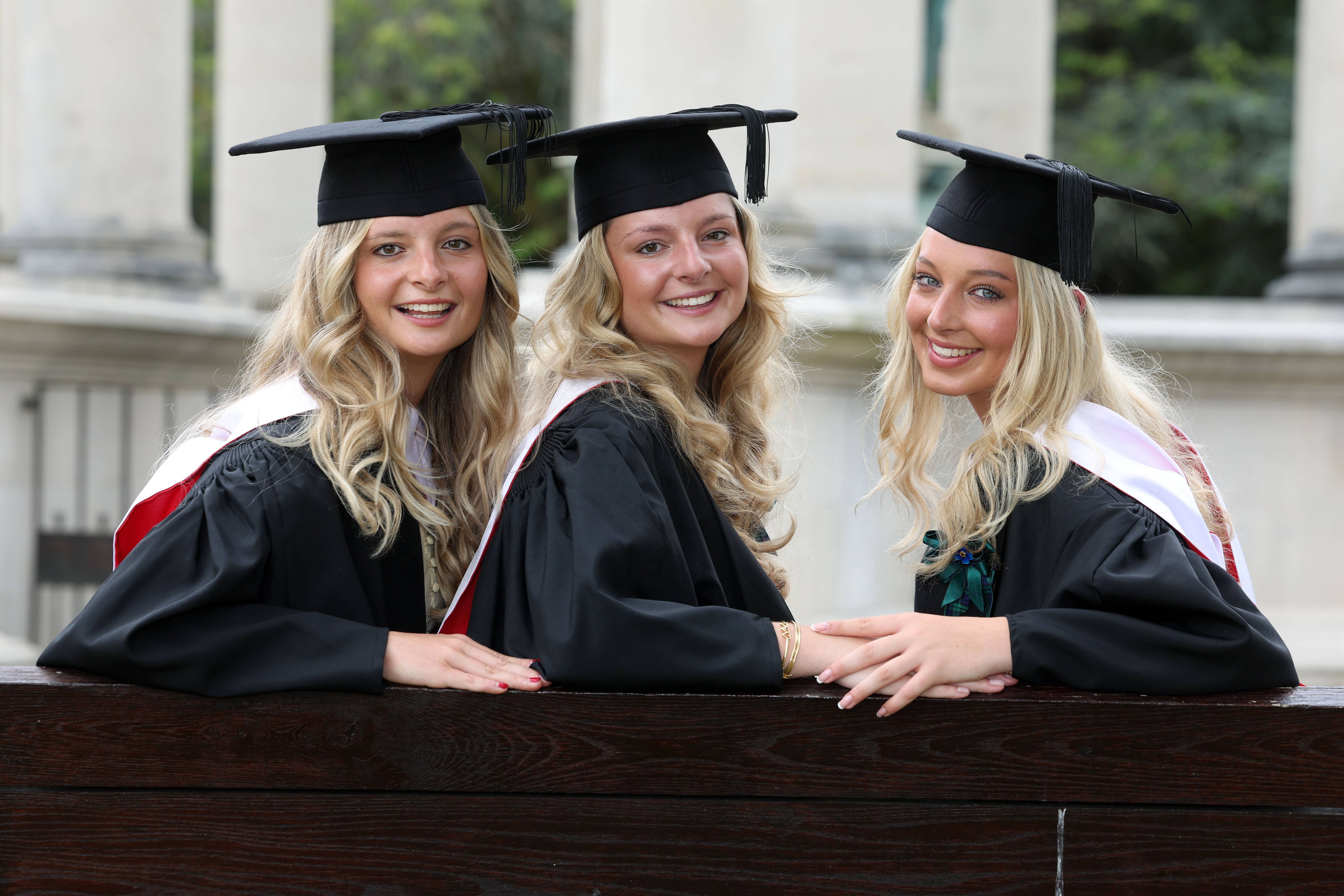 Triplets Rose, Maudie and Grace Orgill graduated together from Cardiff University (Cardiff University/PA)