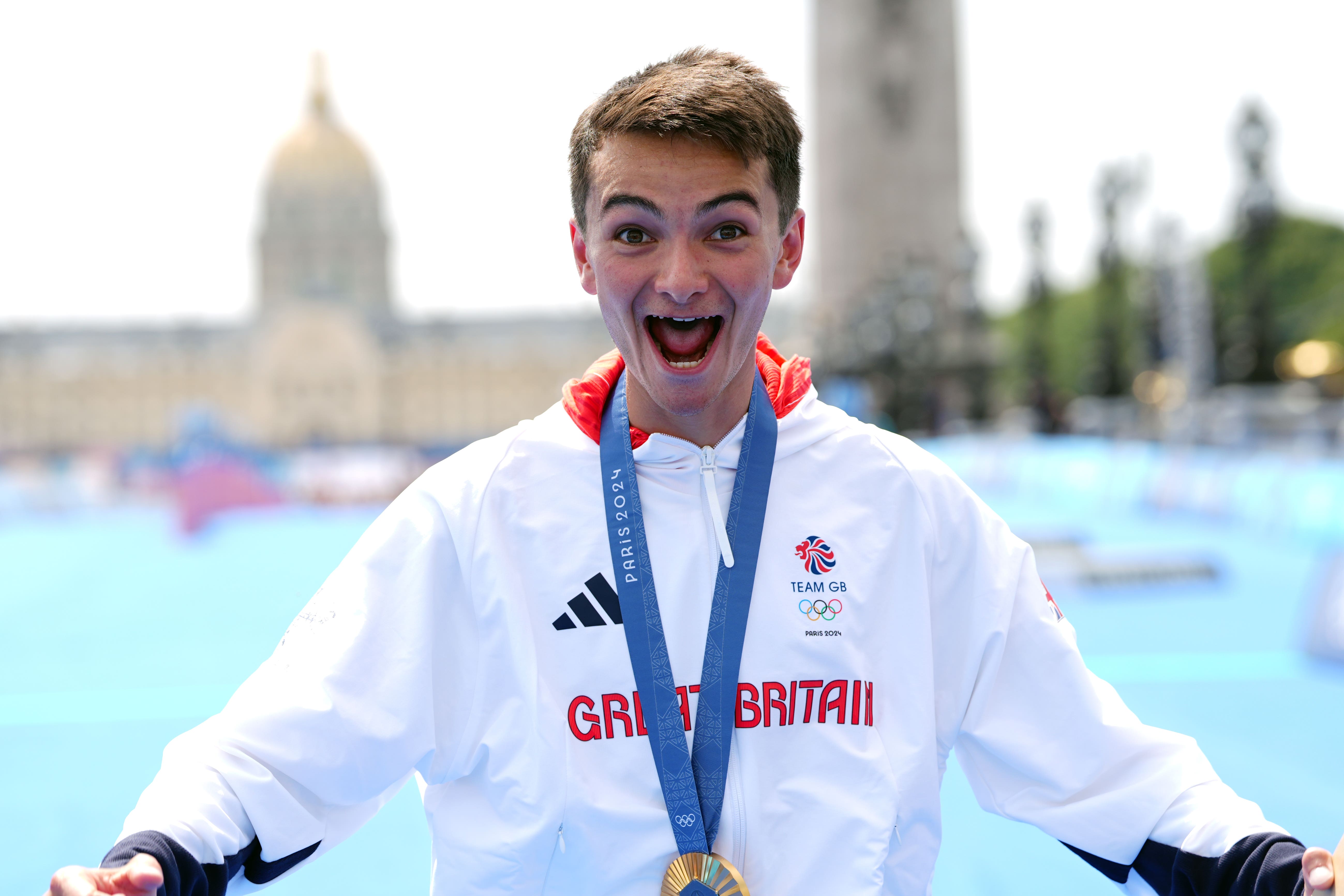 Alex Yee celebrates with his Olympic gold medal in Paris (David Davies/PA)