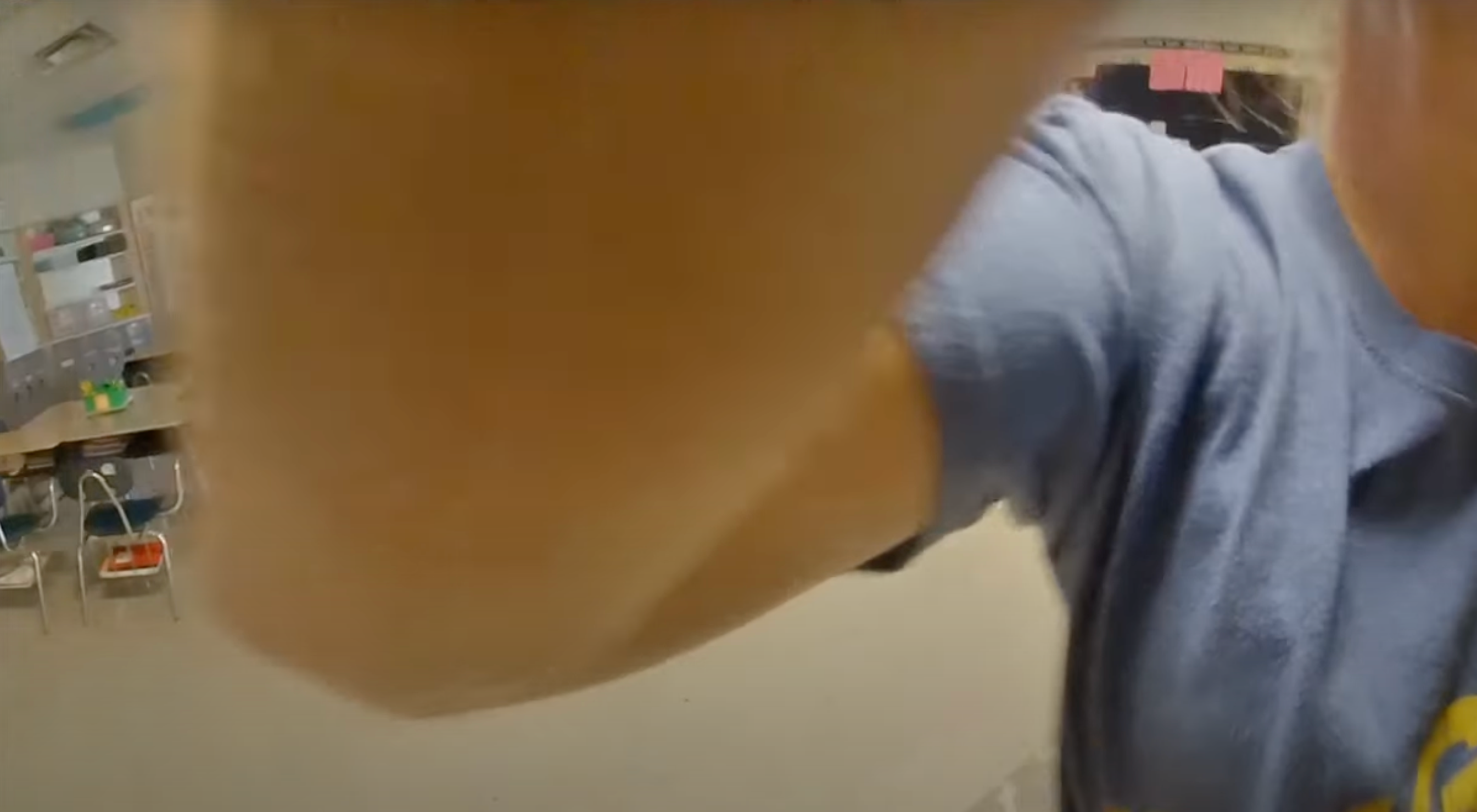 The bodyworn footage showed the pair kissing in a classroom in August 2024, moments after a child leaves the room. The video was blurred to hide the youngster’s identity.