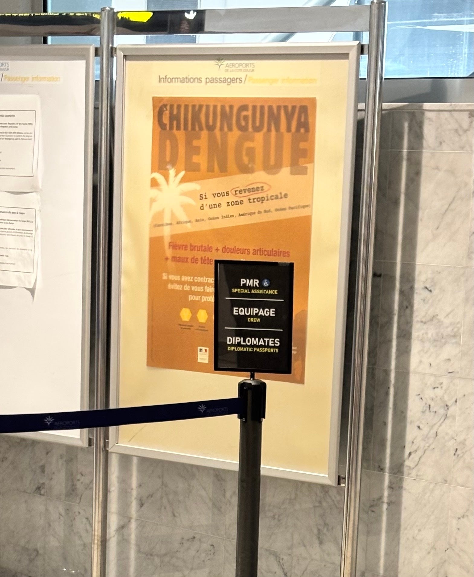 A chikungunya warning poster at Nice Côte d'Azur Airport, France