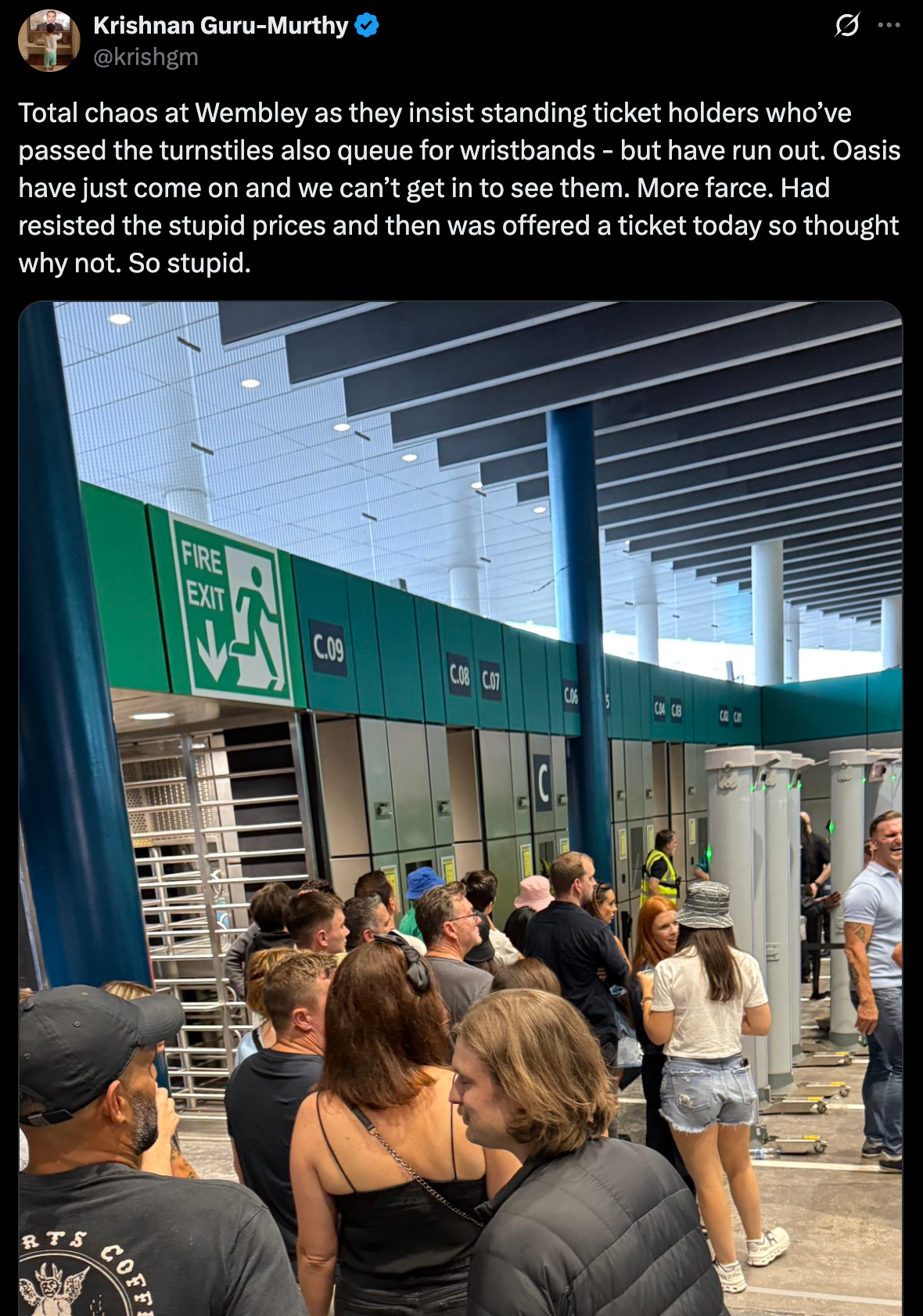 Krishnan Guru-Murthy said standing ticketholders had to queue for wristbands, causing him to miss the beginning of the show