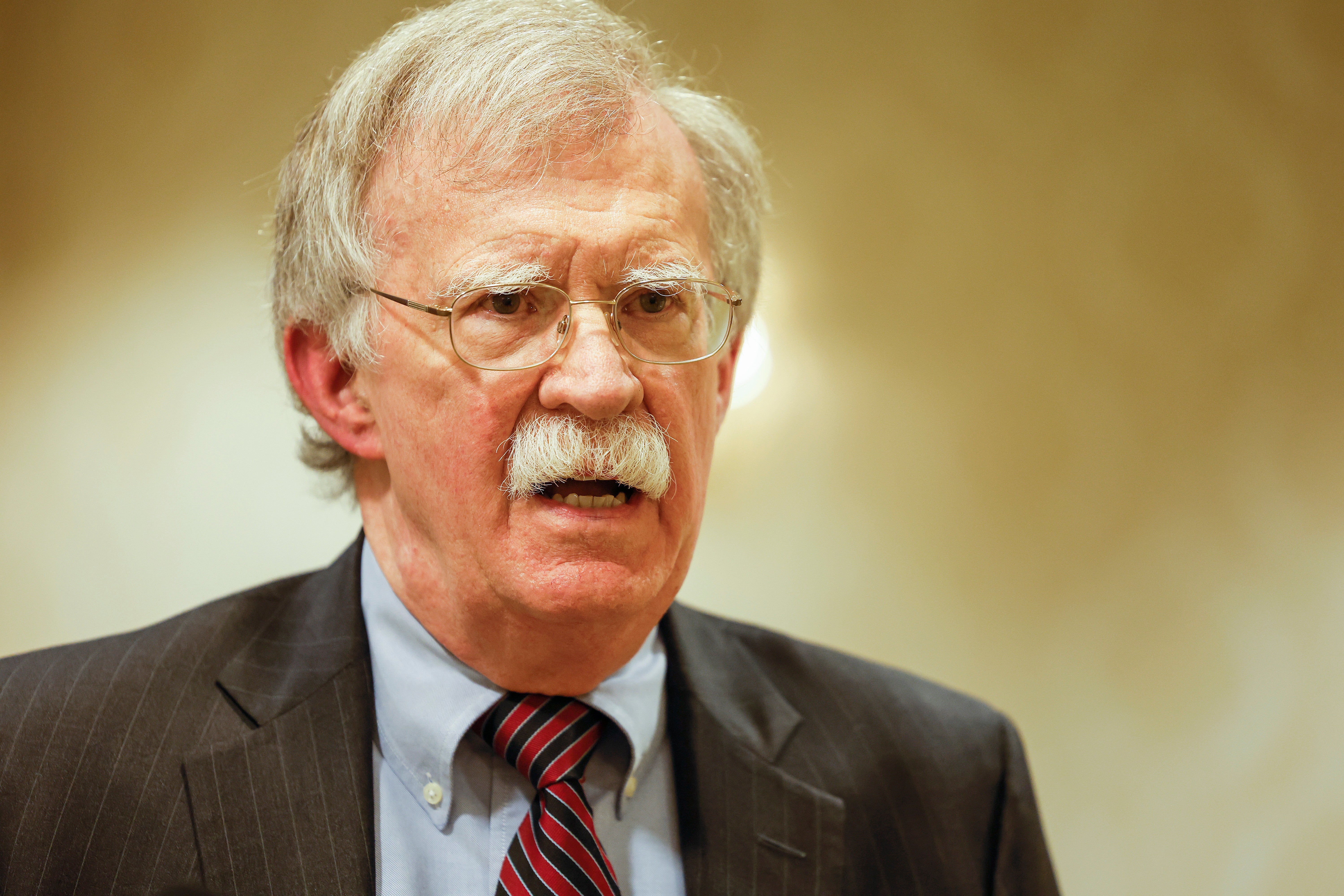 John Bolton said meeting with Putin in Alaska was akin to Trump’s planned 2019 meeting with the Taliban at Camp David