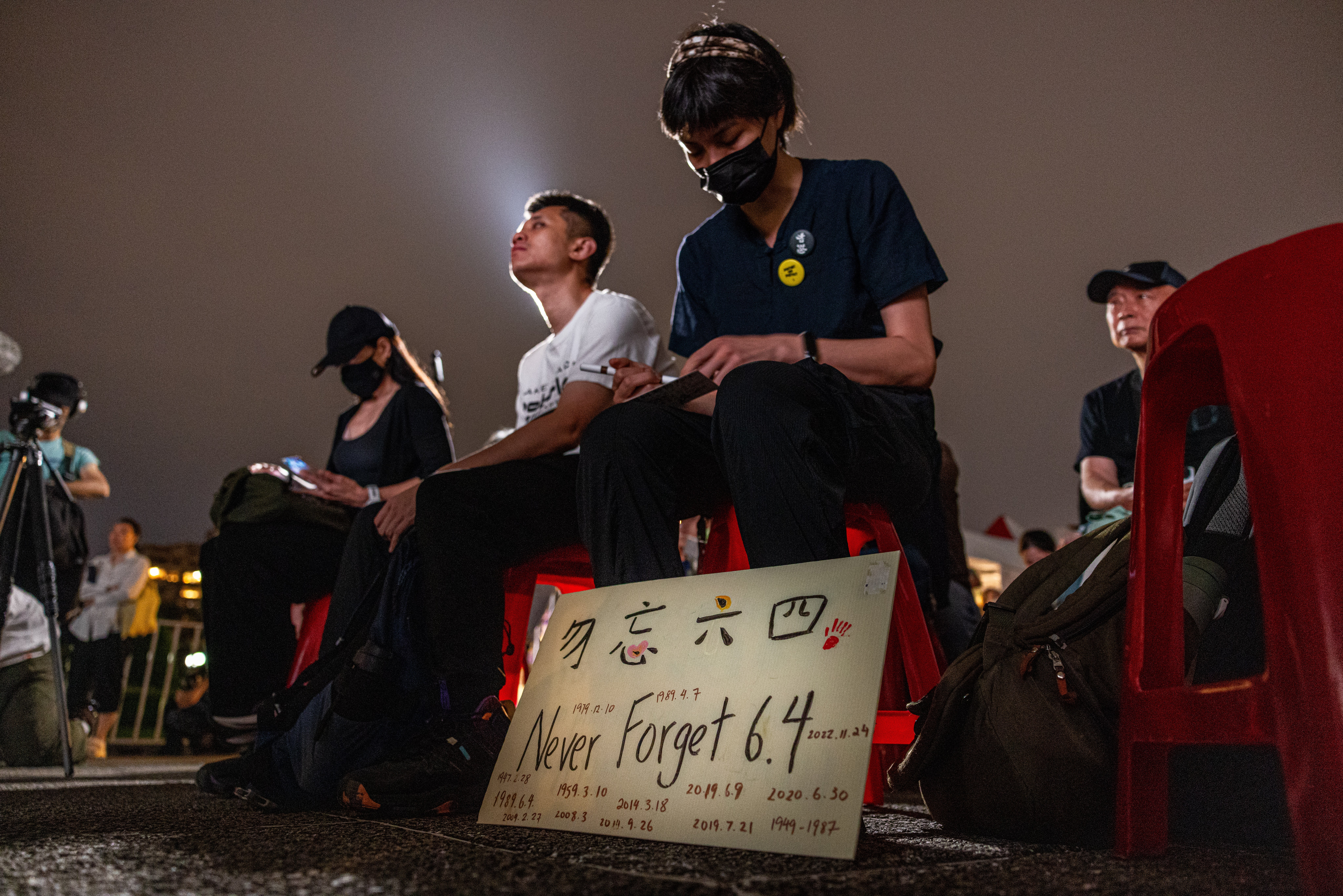 A placard reading "Never forget 6.4", during a vigil of the 36th anniversary of the 1989 Tiananmen Square crackdown at Liberty Square on June 04, 2025 in Taipei, Taiwan