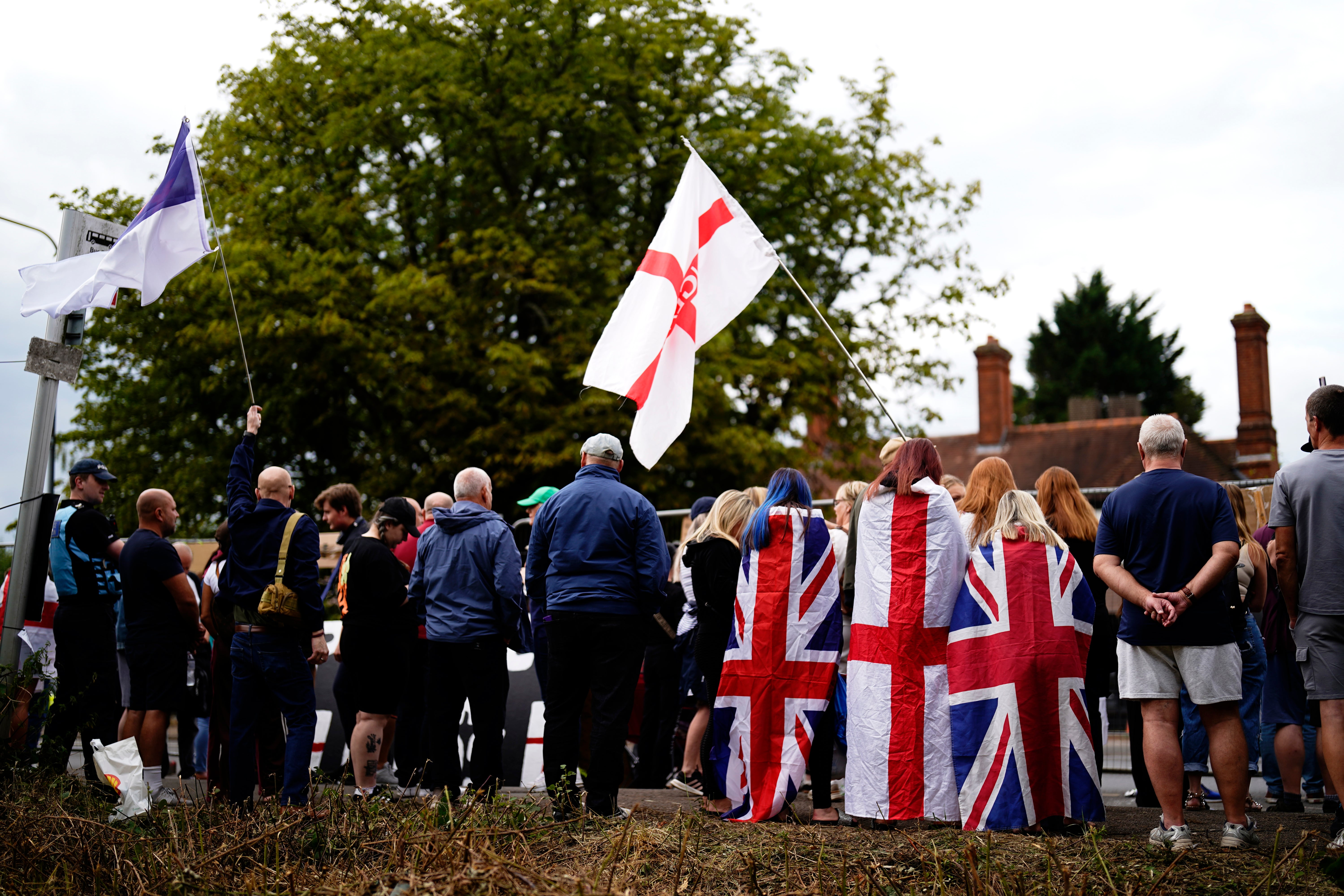 Protesters outside the Bell Hotel in Epping, Essex