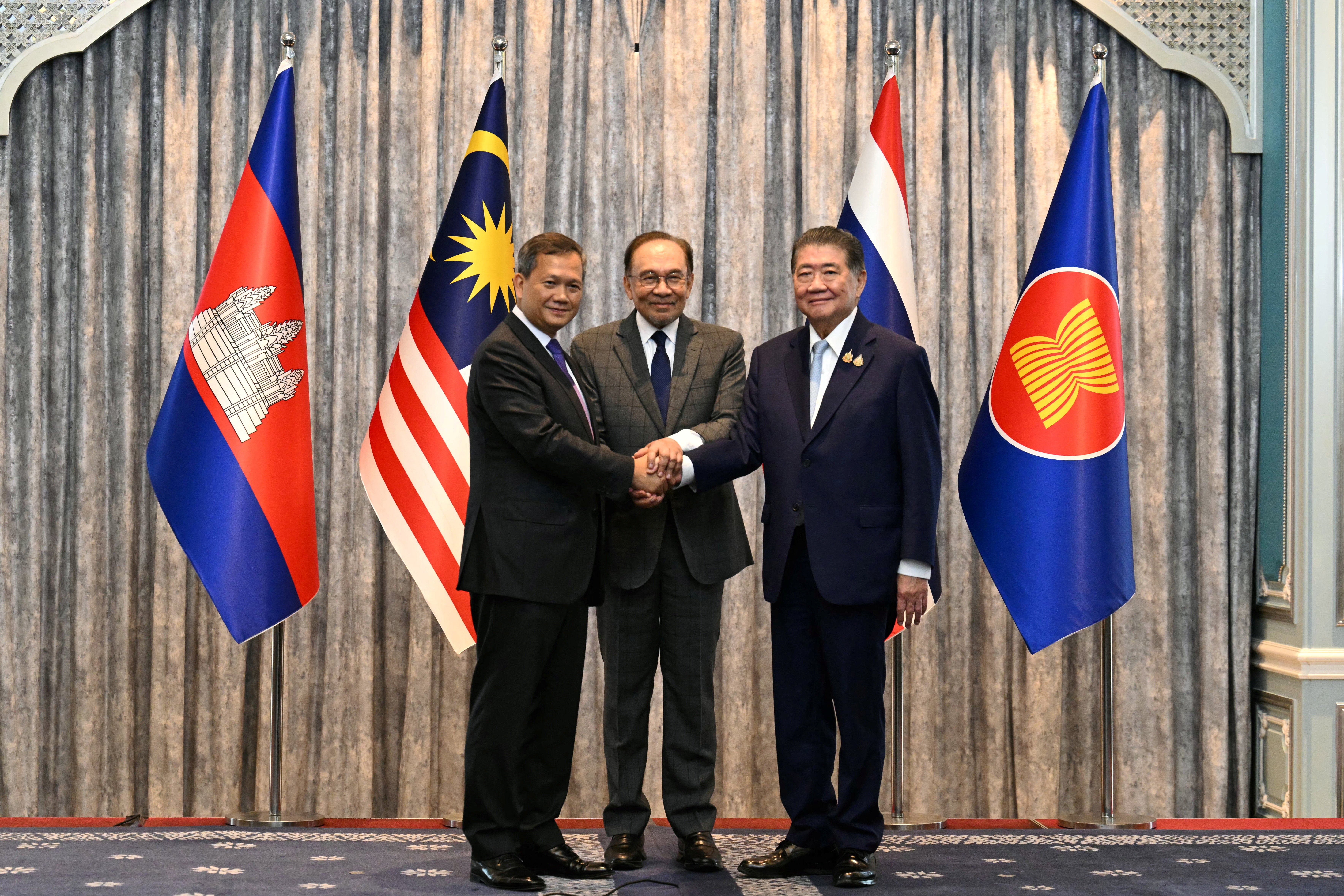 Malaysian prime minister Anwar Ibrahim, center, with Cambodia’s Hun Manet and Thailand's Phumtham Wechayachai