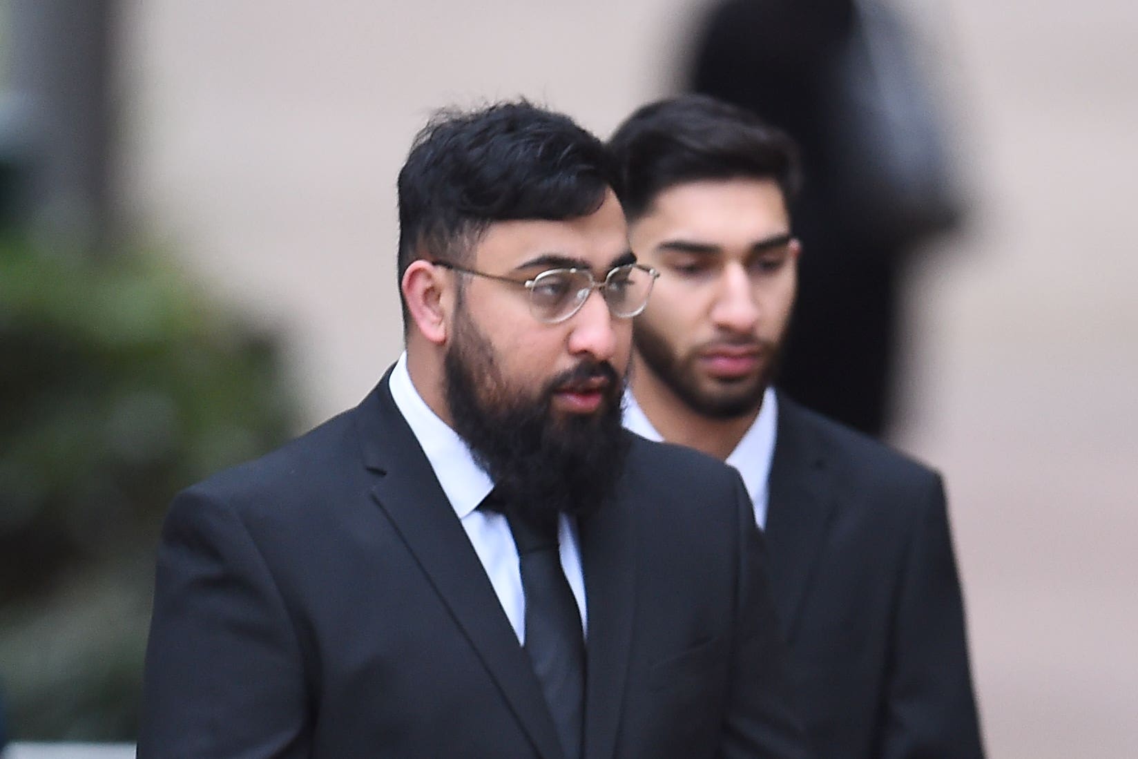Mohammed Fahir Amaaz, right, and Muhammad Amaad, left, arriving at Liverpool Crown Court earlier in the year (Peter Powell/PA)