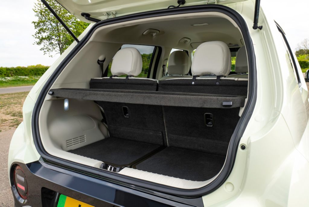 The Hyundai Inster's boot is big enough for squashy bags, while the rear seats slide forward and every single seat inside folds flat so you can sleep in there if you want to