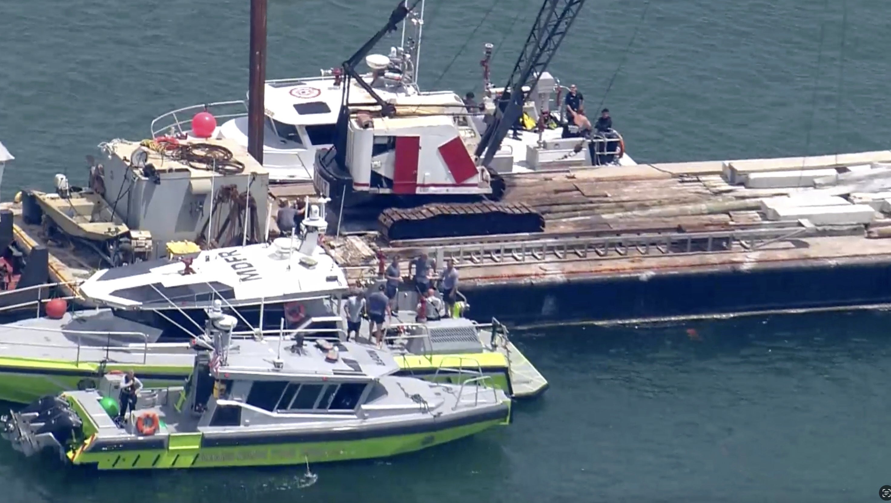 The collision between a barge and a sailboat occurred around 11am on Monday in Biscayne Bay, between Miami and Miami Beach
