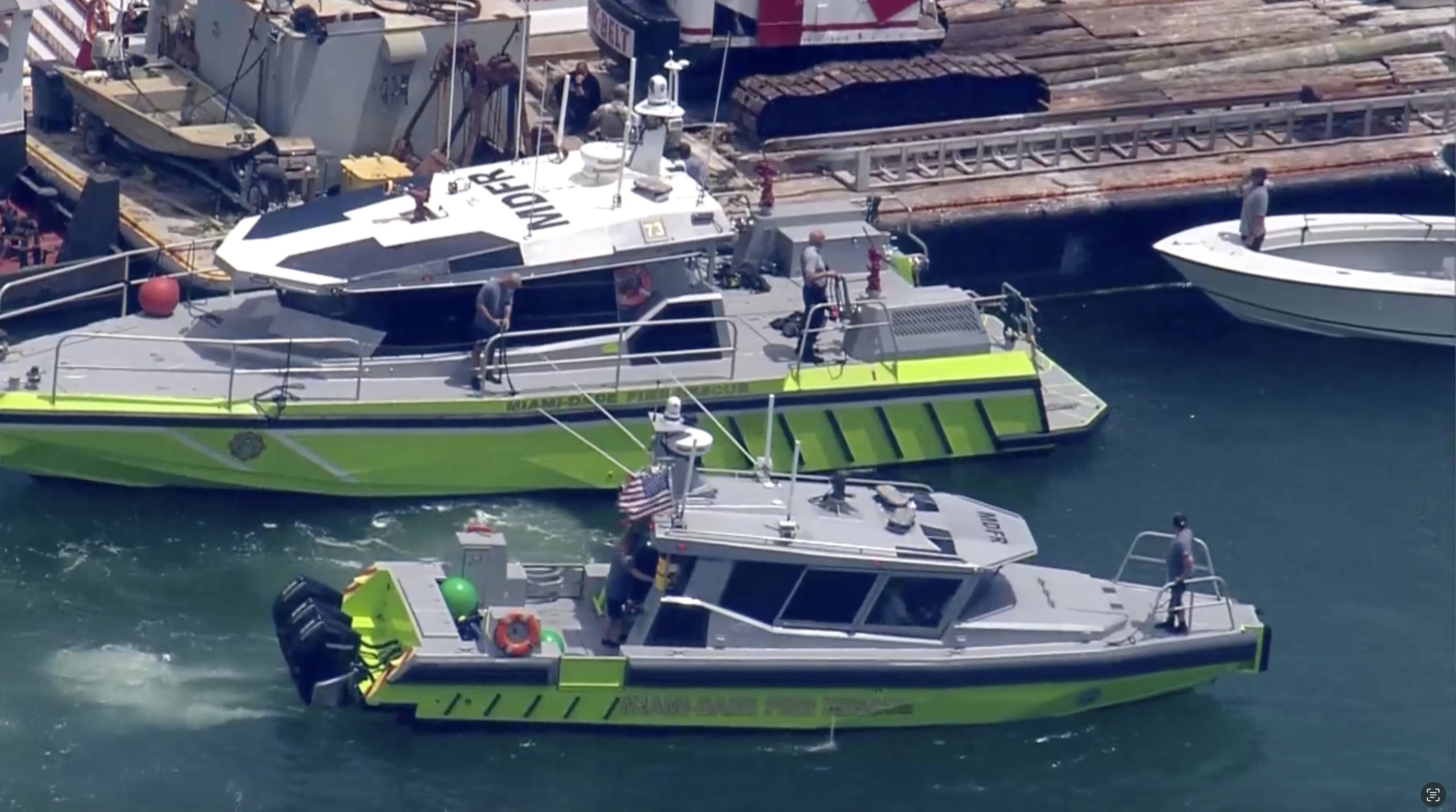 A 7-year-old girl and a 13-year-old girl died in the crash between a barge and a sailboat