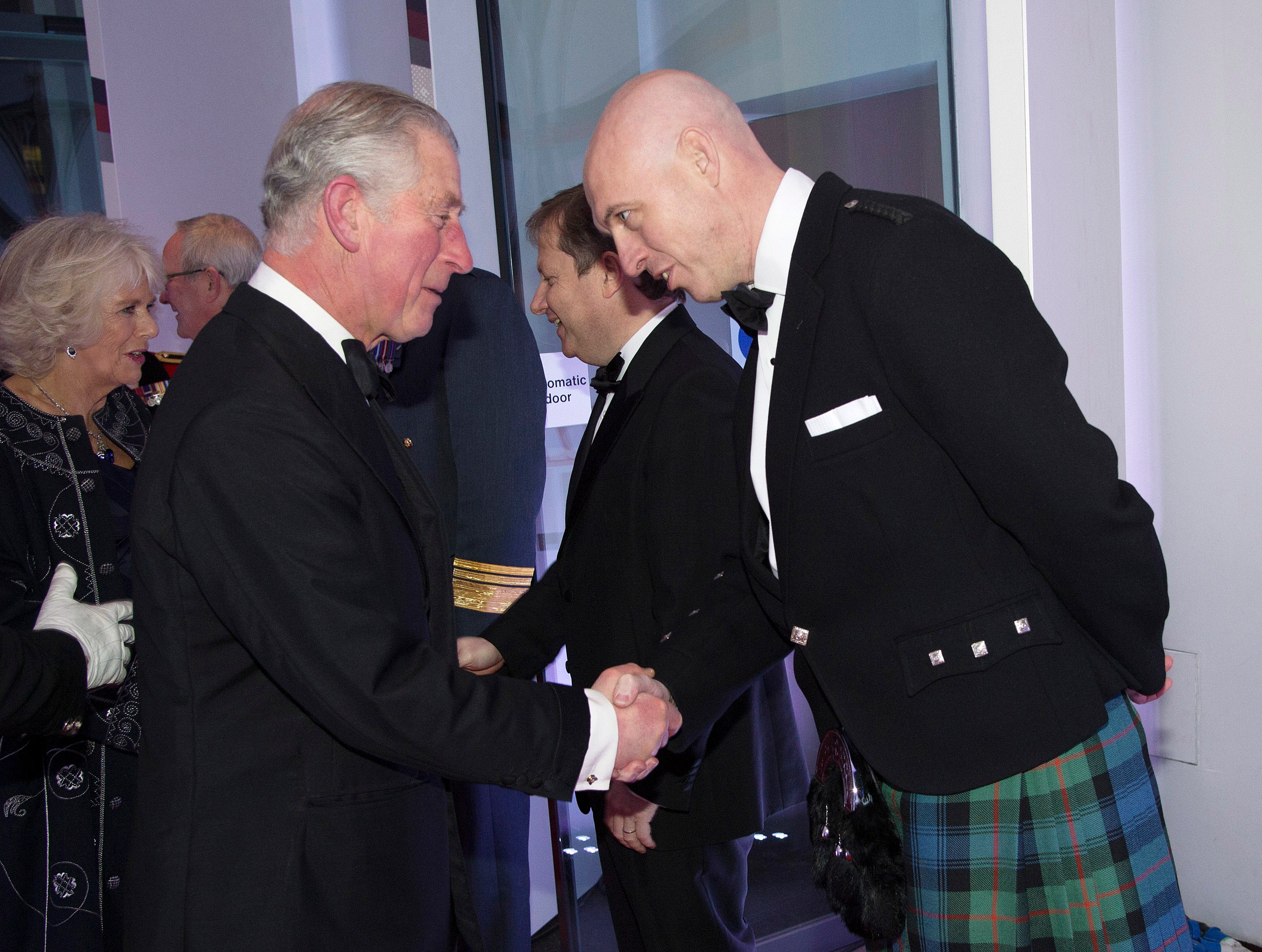 David Dinsmore meets then-Prince Charles in 2014
