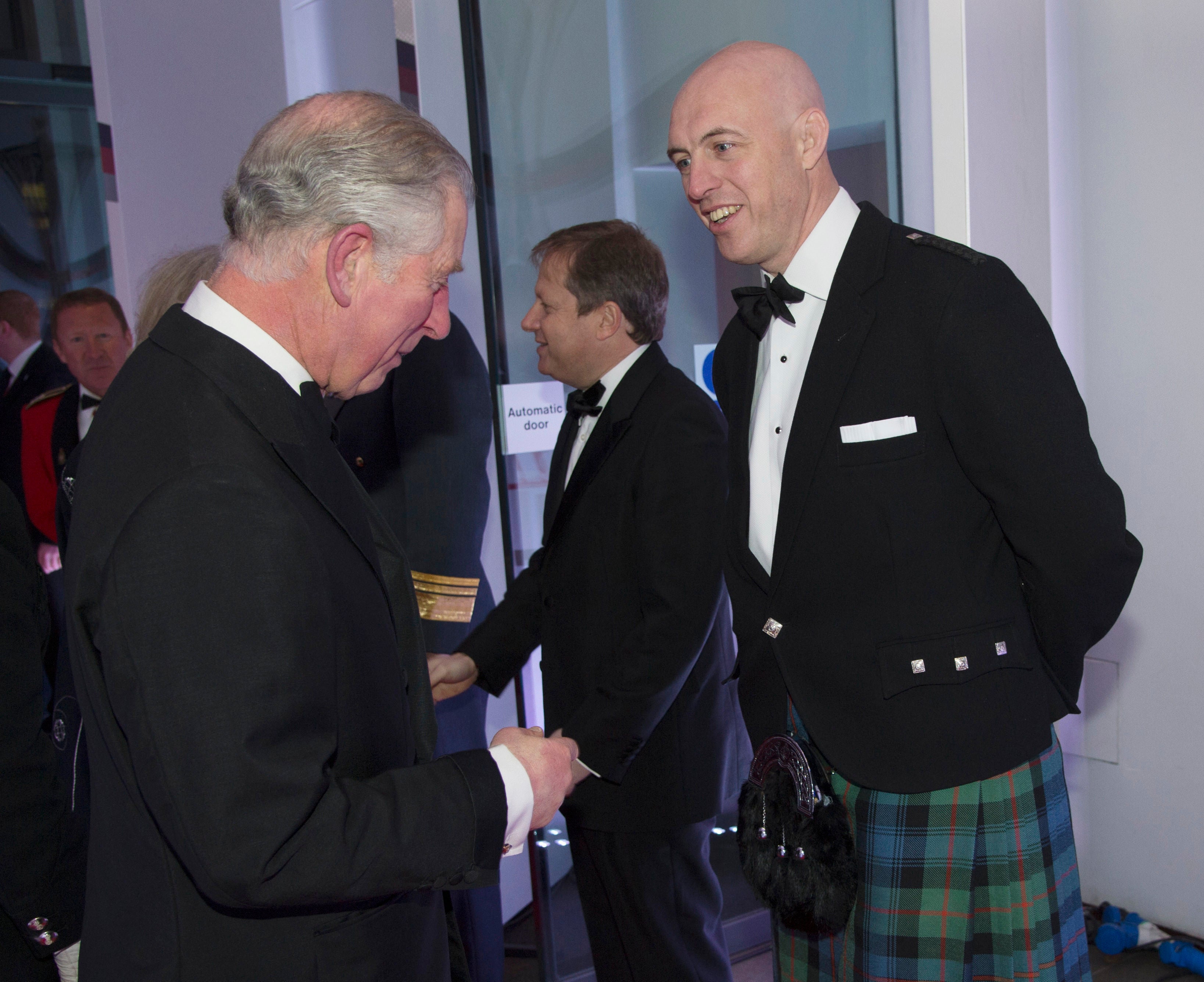 David Dinsmore meets then-Prince Charles in 2014
