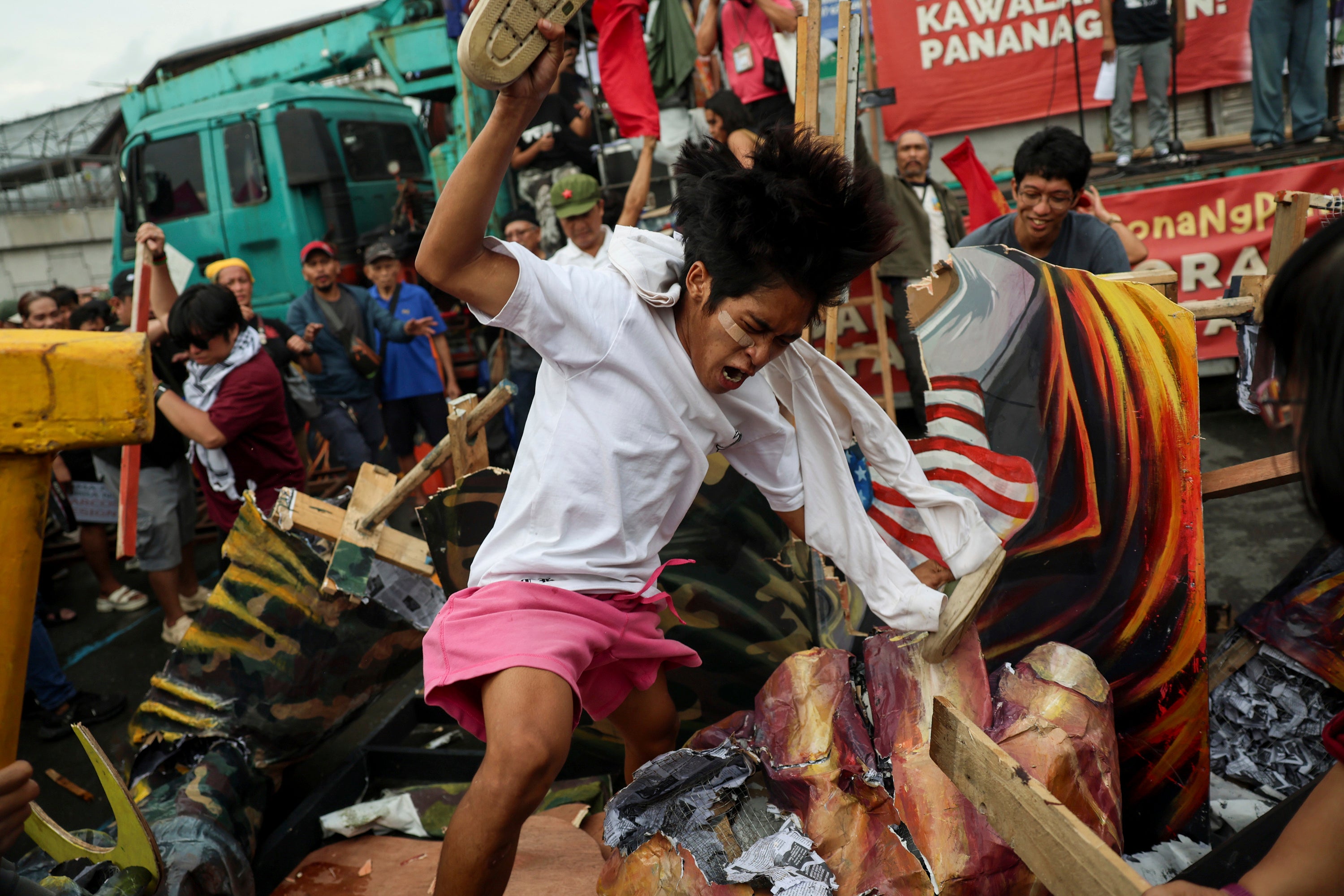 File. Protesters destroy an effigy of president Ferdinand Marcos Jr ahead of his State of the Nation Address in Quezon City, Philippines, on 28 July 2025
