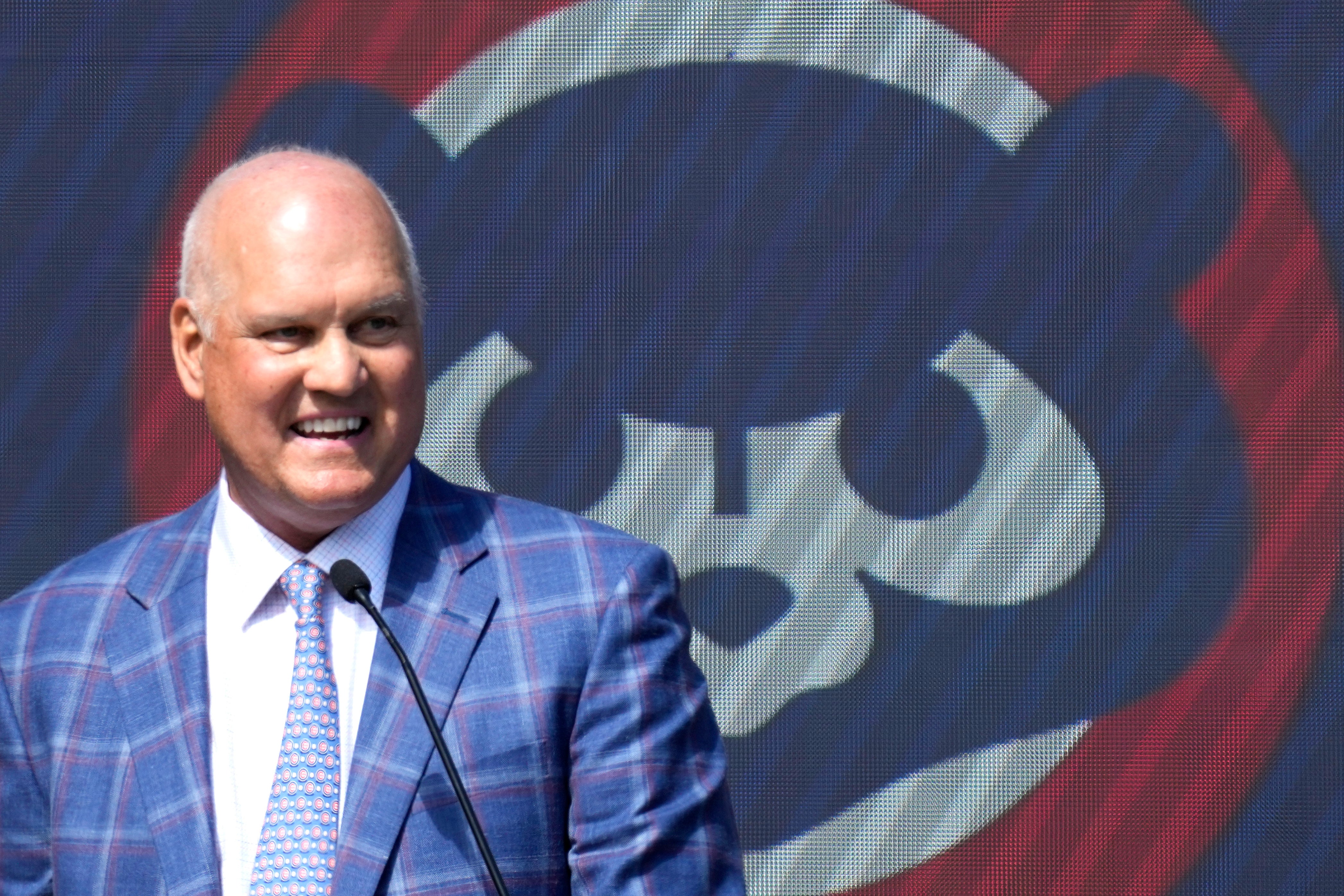 Former Chicago Cubs player Ryne Sandberg speaks before the team unveils a statue of him before a baseball game against the New York Mets