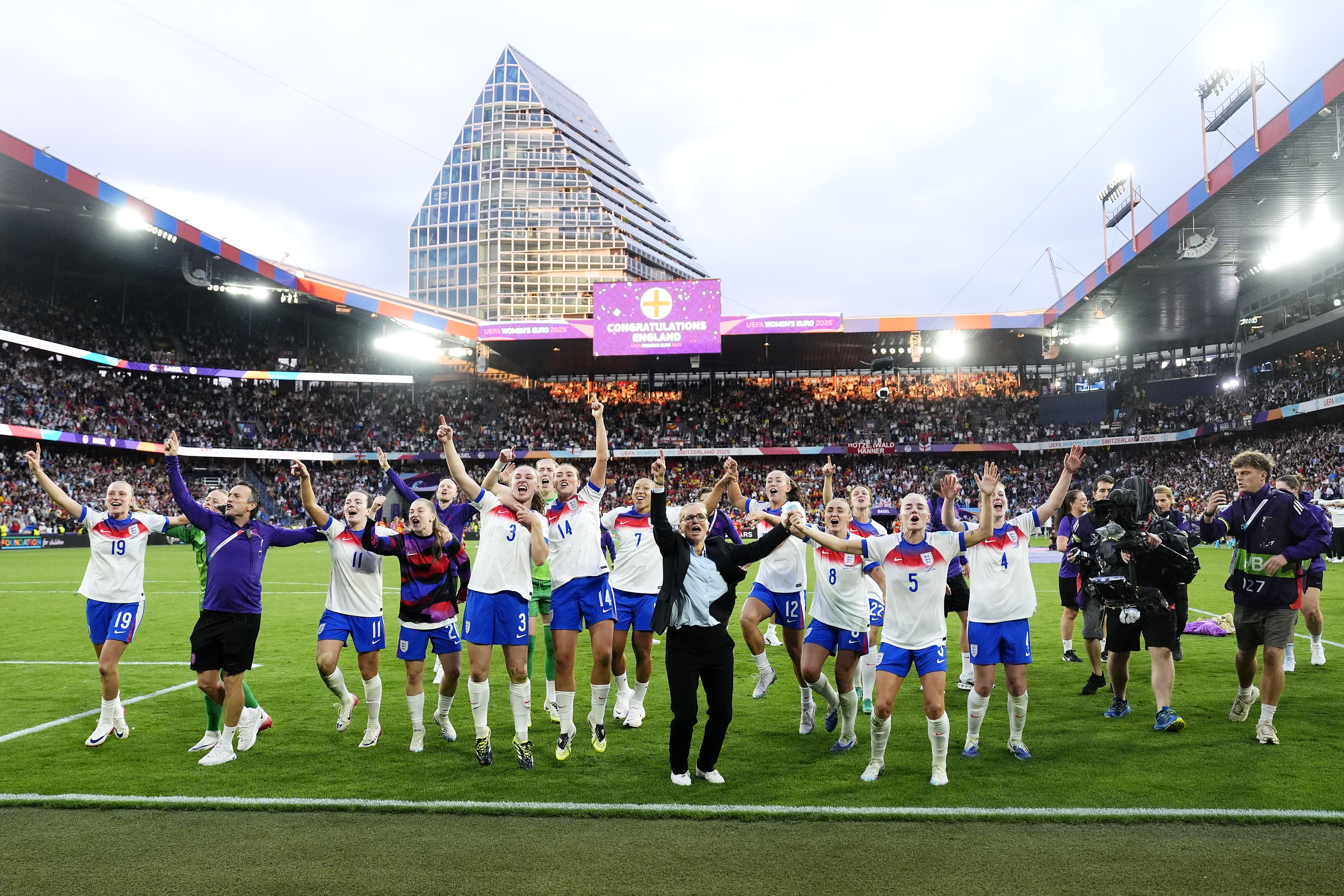 England manager Sarina Wiegman (centre) and players celebrate Euro 2025 glory (Nick Potts/PA)