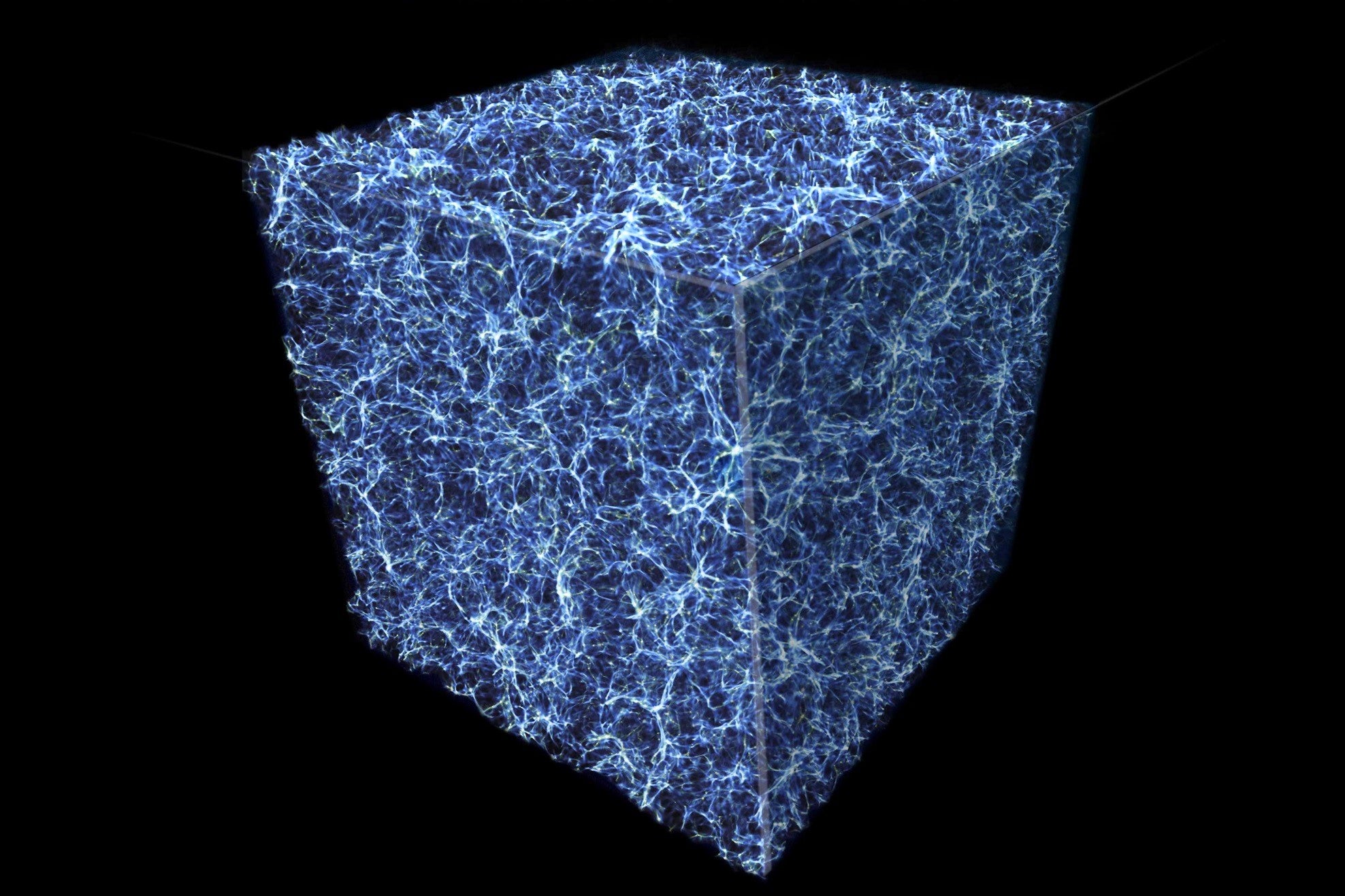 A simulation of the matter distribution in a cubic section of the universe. The blue fibre structures represent the matter and the empty regions in between represent the cosmic voids