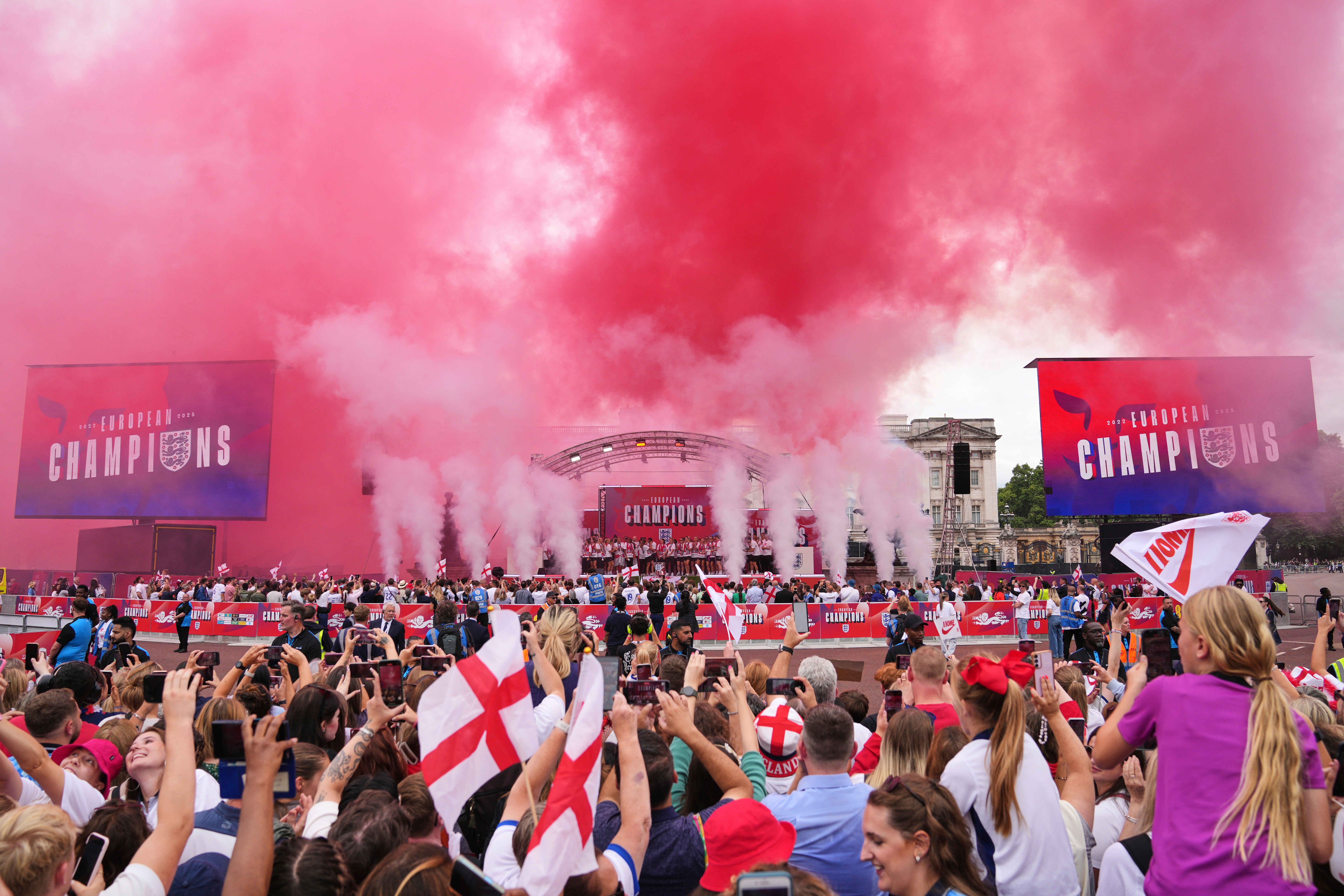 Cheers erupted as large red fireworks went up into the sky and the tune of ‘Sweet Caroline’ could be heard across the park