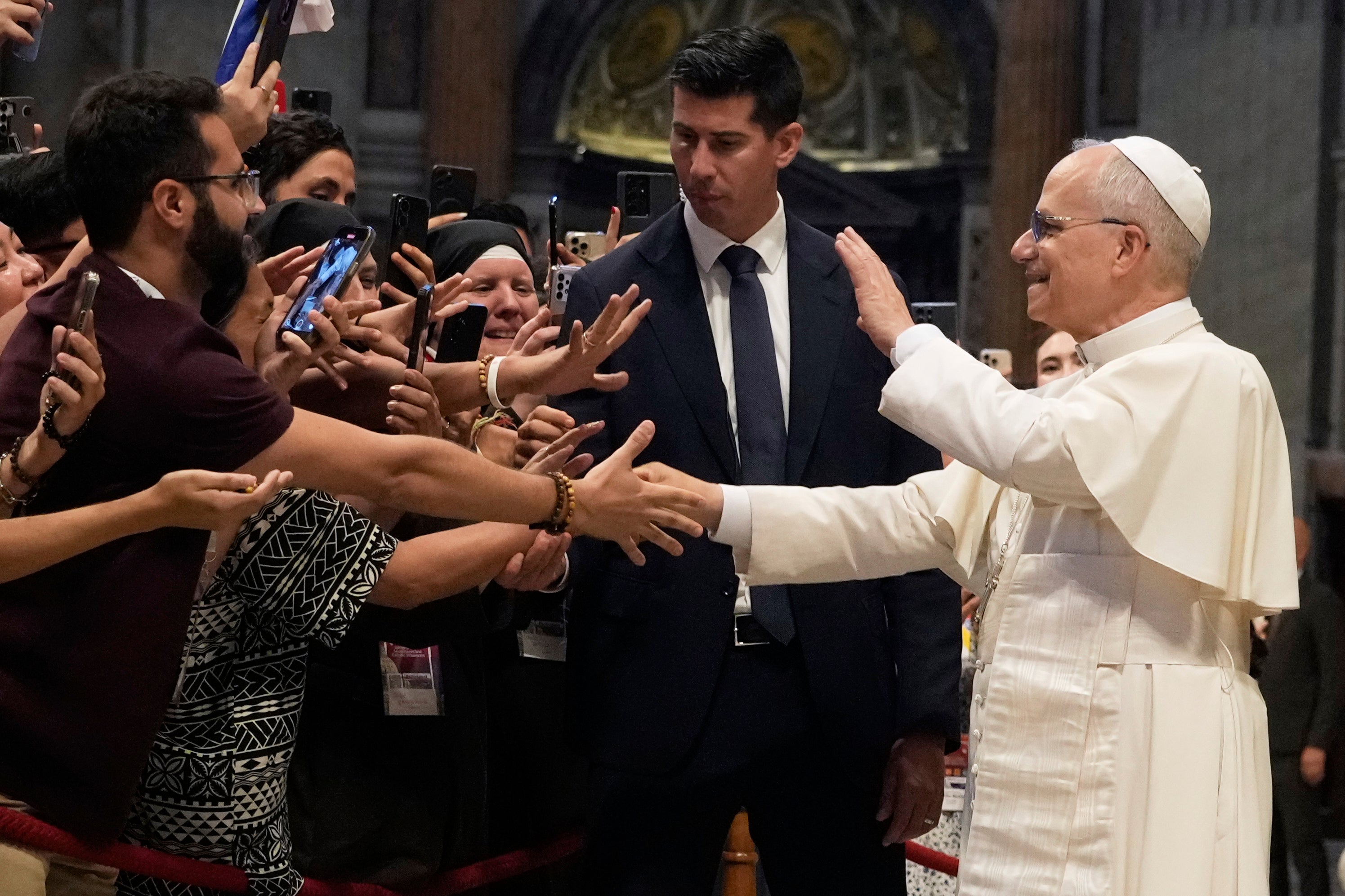 Pope Leo XIV mobbed by Catholic influencers at Vatican festival