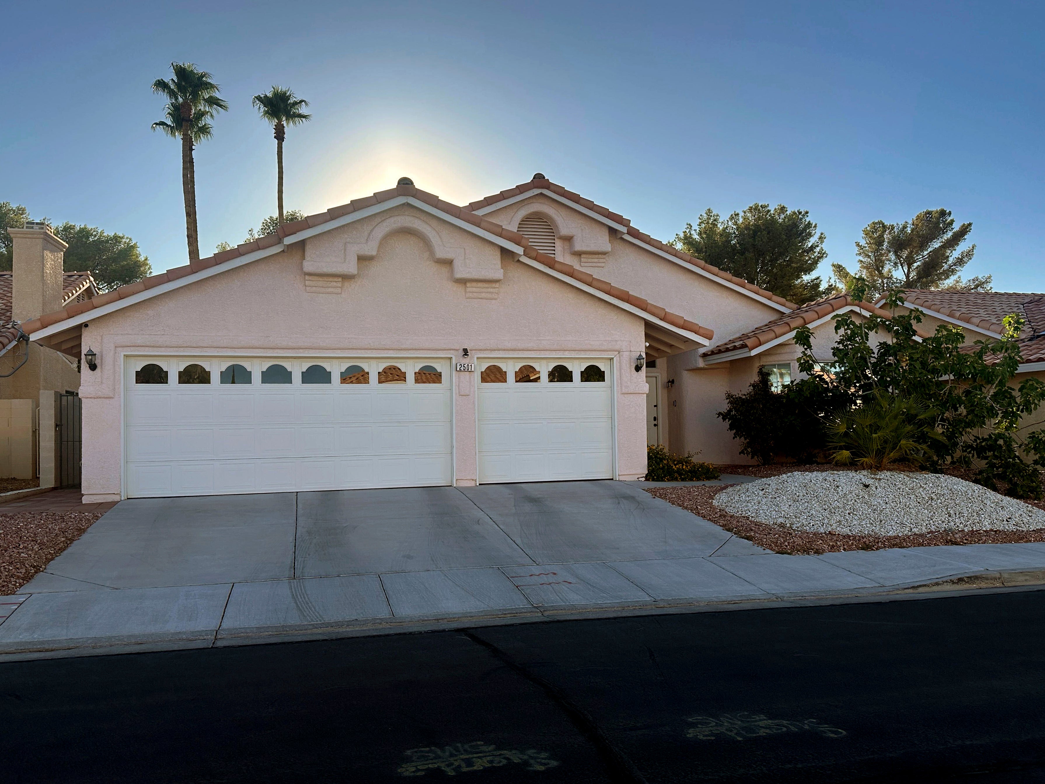 The Las Vegas home where gunman Shane Tamura lived with his parents. Authorities have now descended on the property in a search for further information about what may have led up to the bloodbath.
