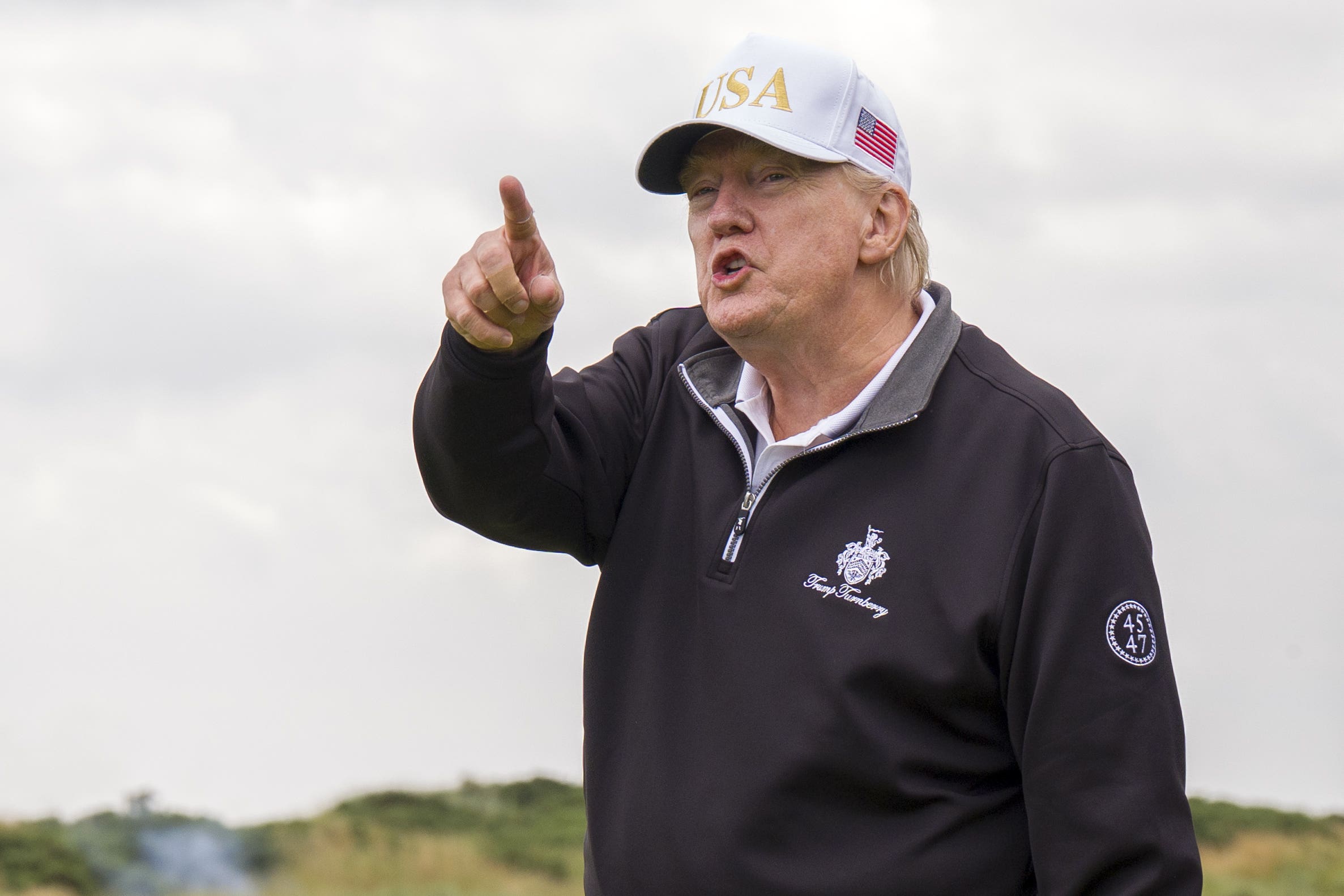 US President Donald Trump has opened a new golf course in Scotland (Jane Barlow/PA).